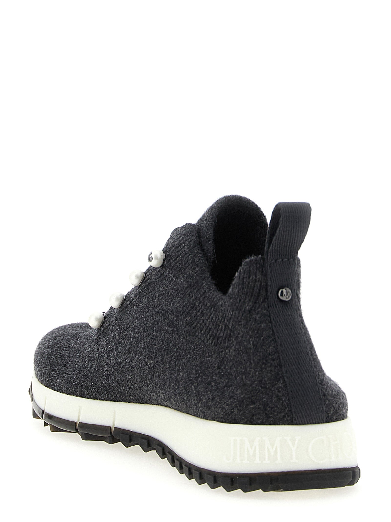 Step into unparalleled elegance with Jimmy Choo's Veles sock sneakers, where luxurious cashmere knit meets sophisticated design, perfect for the discerning individual.
