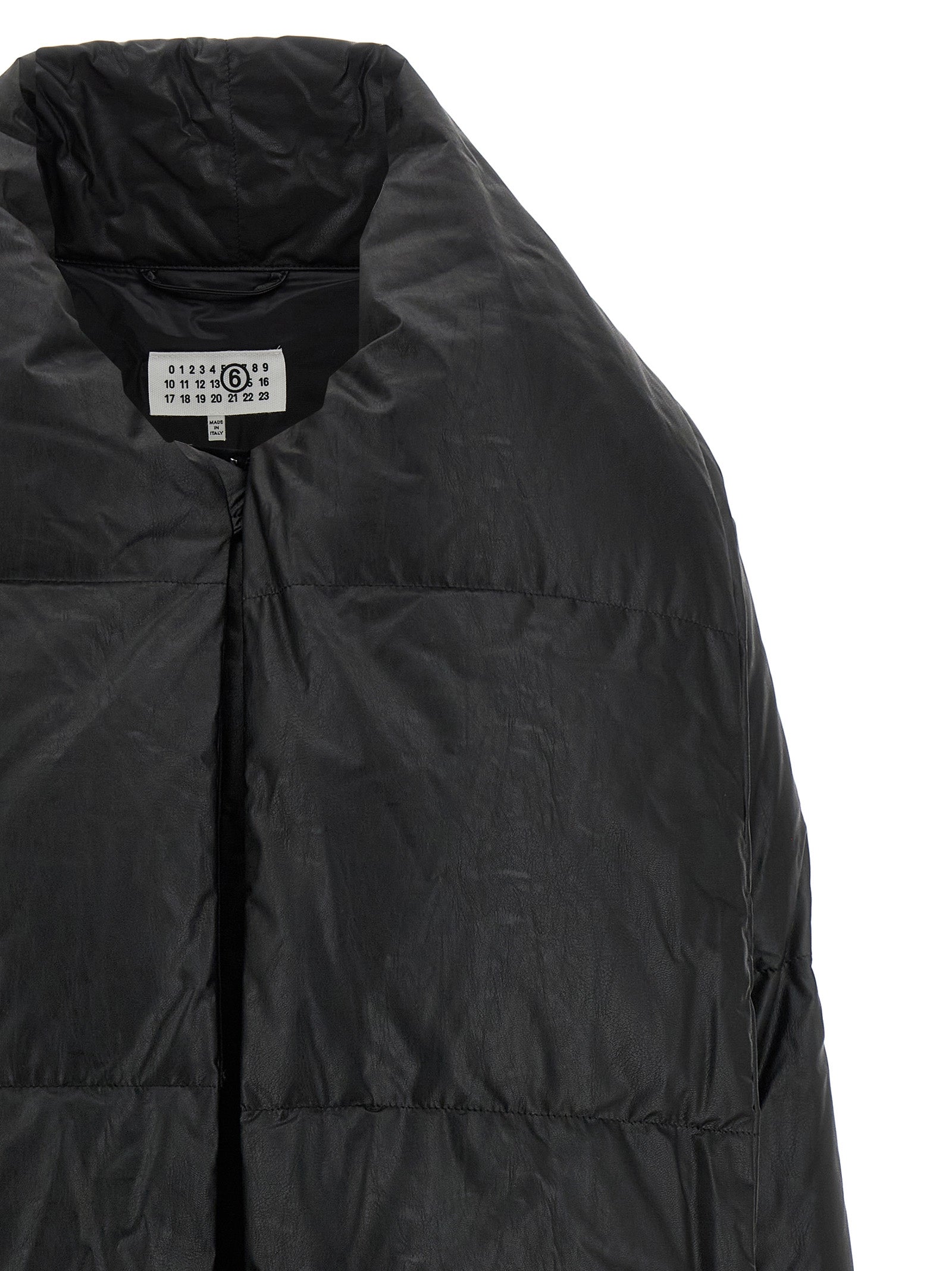 Elevate your style with the MM6 Maison Margiela Black Viscose Coat, a luxurious blend of warmth and elegance, crafted from exquisite viscose for the modern connoisseur.