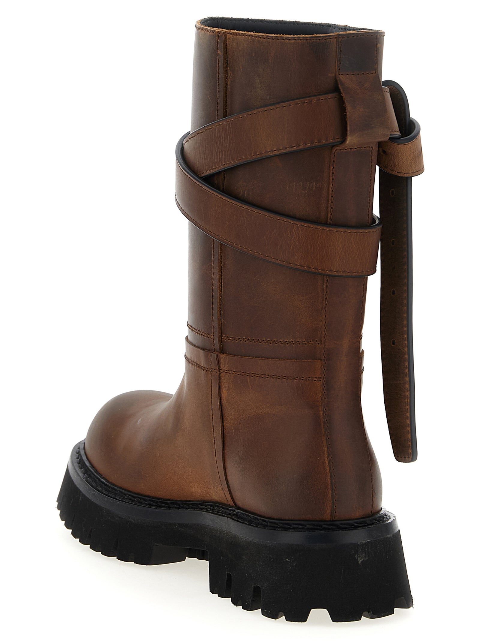 Step into elegance with Moschino's Brown Velvet Leather Over The Knee boots, crafted from exquisite leather, embodying luxury and modern chic for the discerning trendsetter.