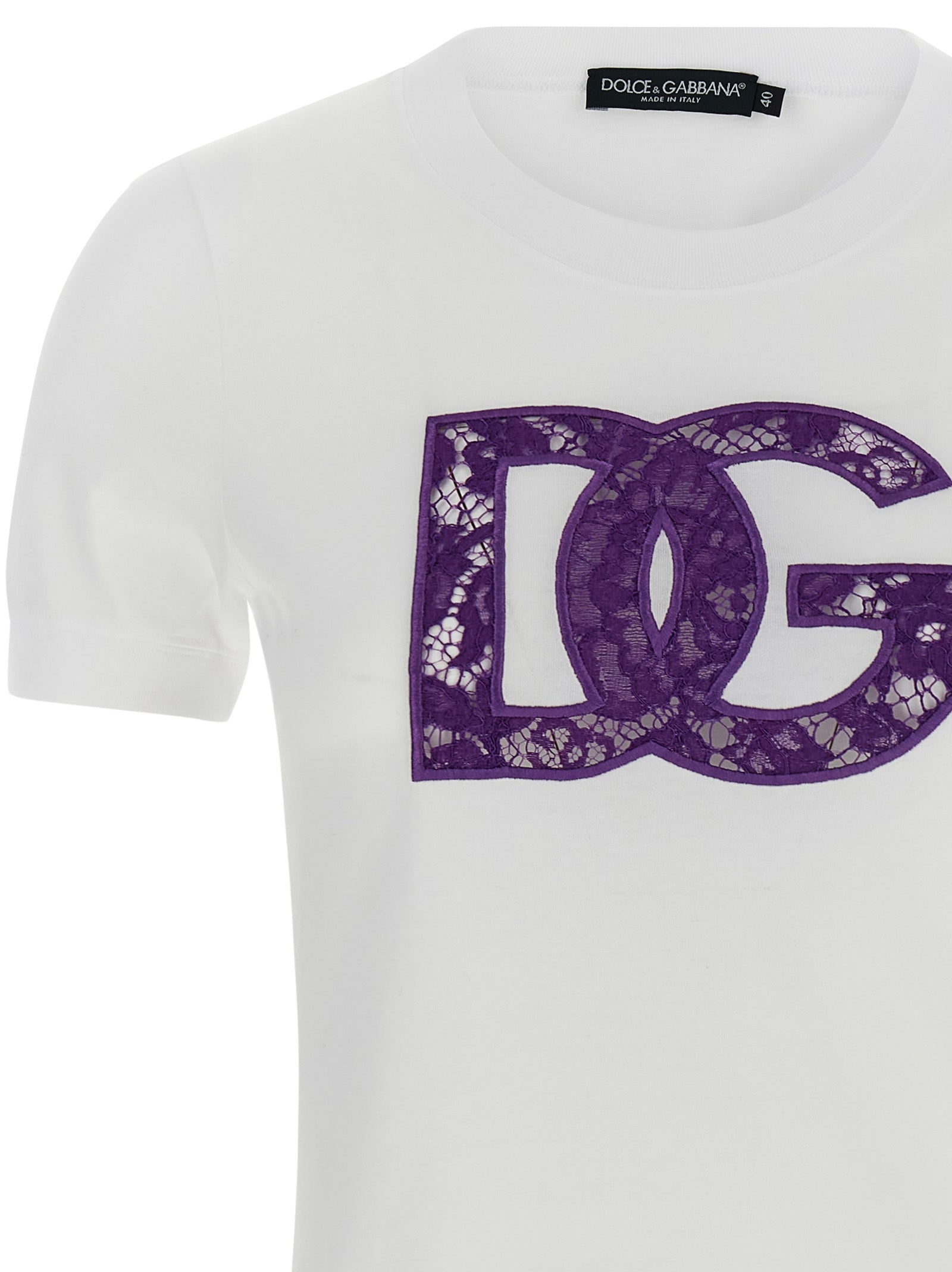 Discover the Dolce & Gabbana White Cotton T-Shirt, a masterpiece of artisanal elegance crafted in Italy, featuring a stunning lace logo insert for timeless sophistication.