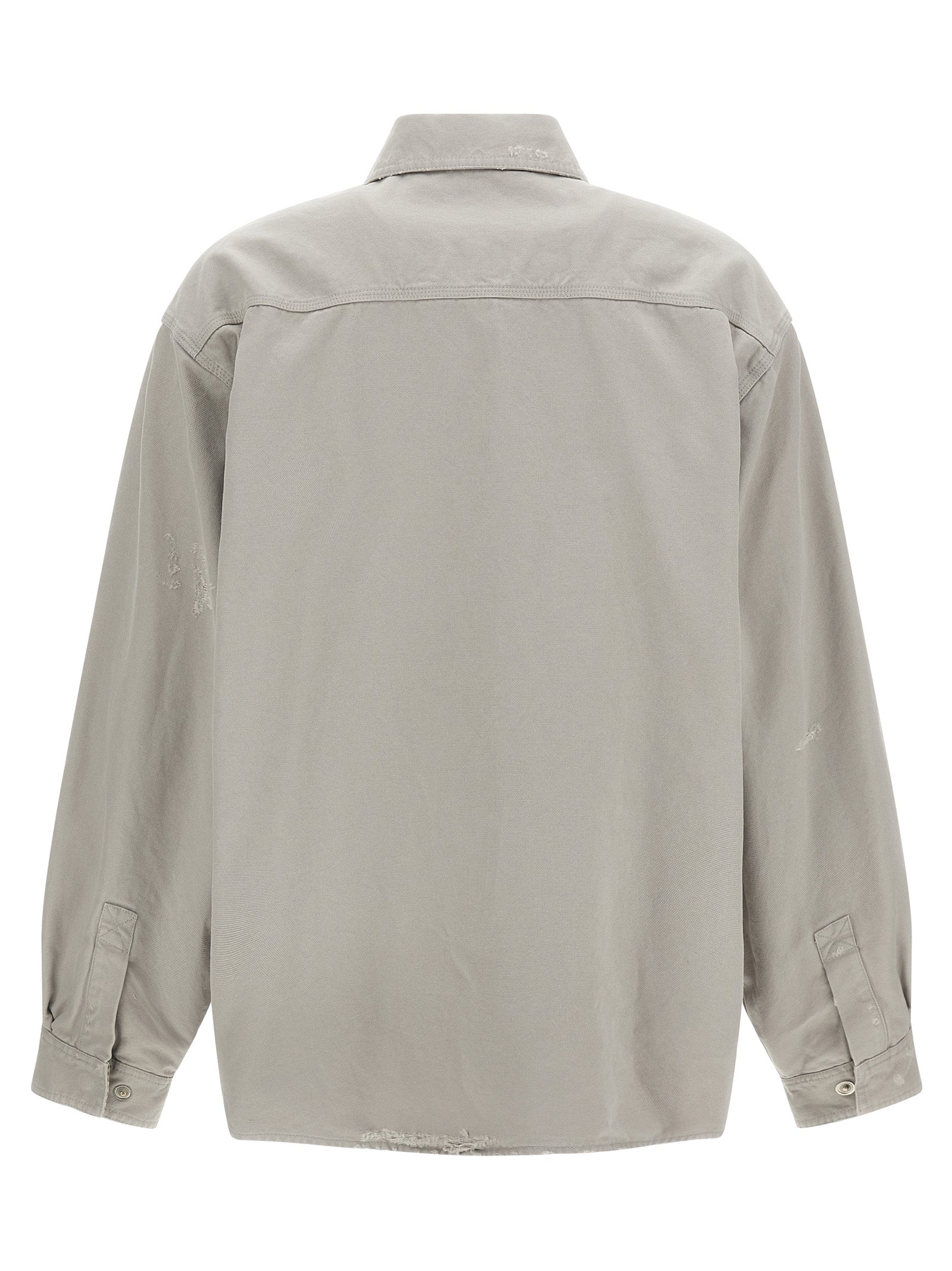 Discover the Balenciaga Gray Cotton Blouse, a luxury streetwear masterpiece crafted from heavy used-effect cotton canvas, perfect for those who embrace sophistication and style.