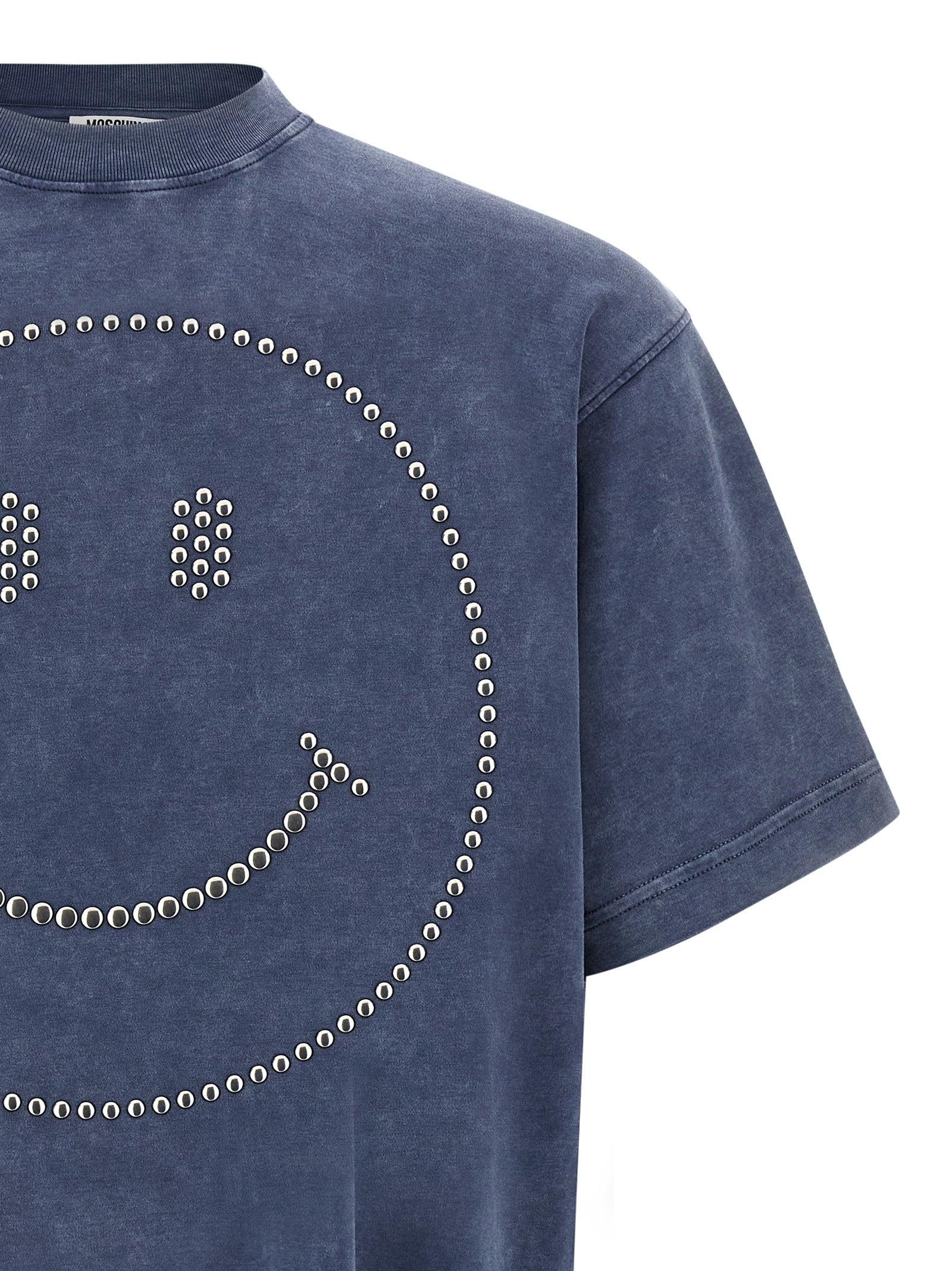 Elevate your wardrobe with the Moschino Blue Cotton T-Shirt, a luxurious statement piece crafted from 100% heavy cotton, embodying bold elegance and timeless sophistication.