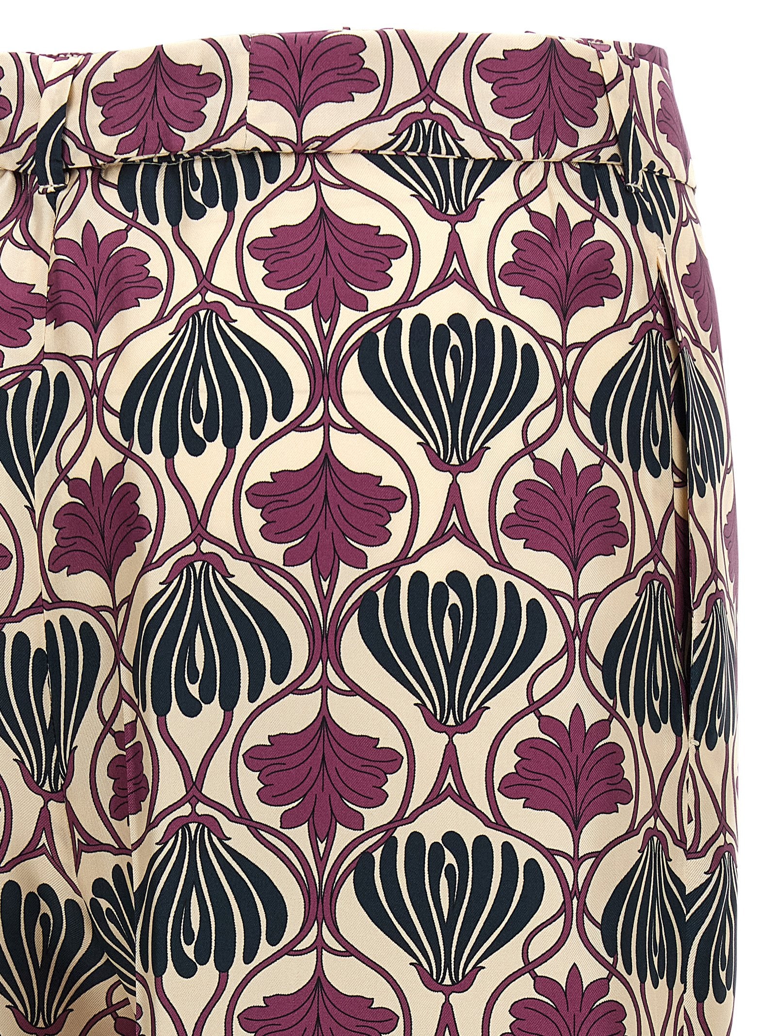 Elevate your wardrobe with Max Mara's Purple Silk Casual Pants, a luxurious blend of elegance and sophistication, perfect for any refined occasion.