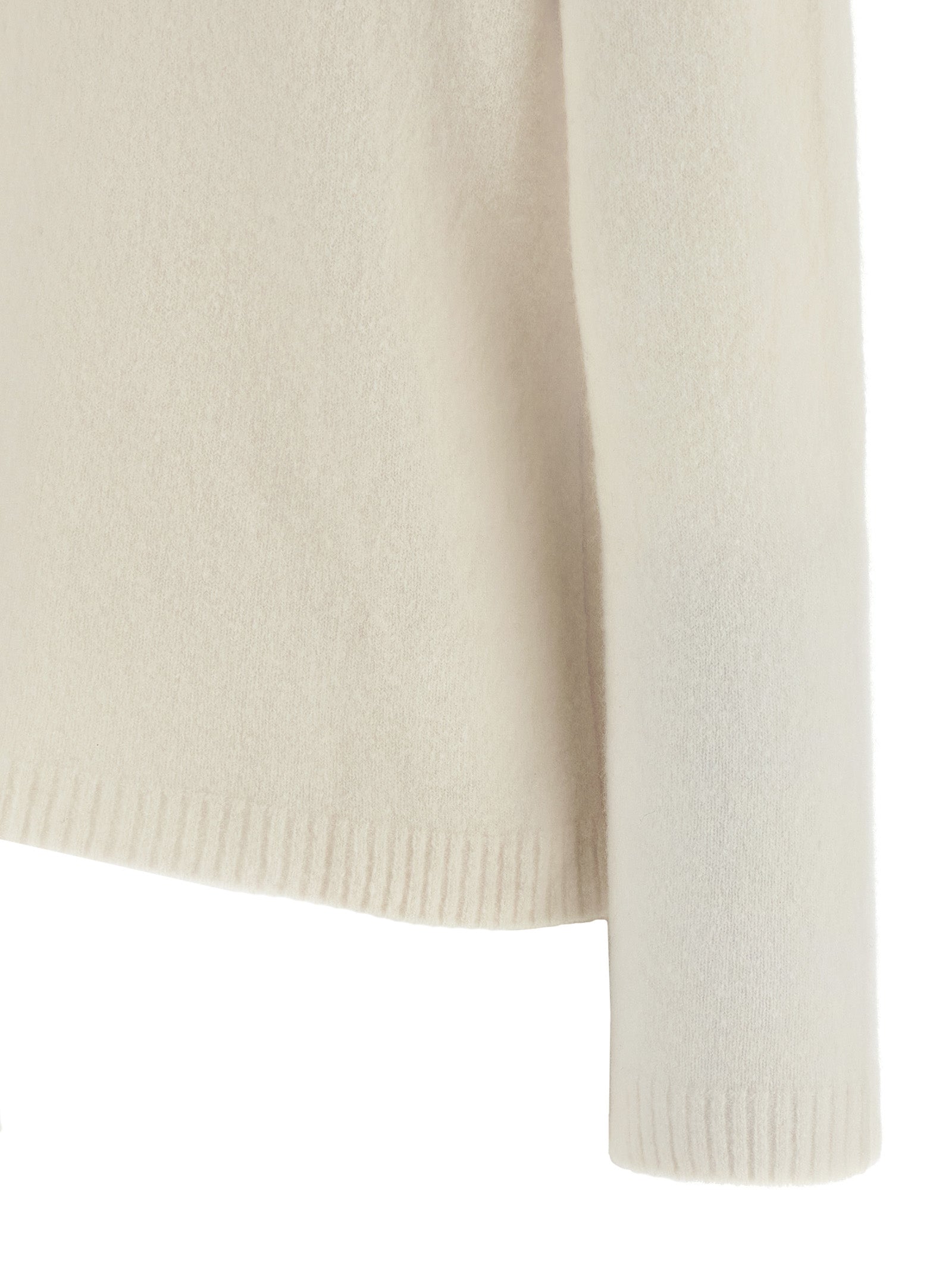 Indulge in the Max Mara White Cashmere Cardigan from the Orlaya collection, crafted for timeless elegance and luxurious comfort, perfect for any sophisticated occasion.