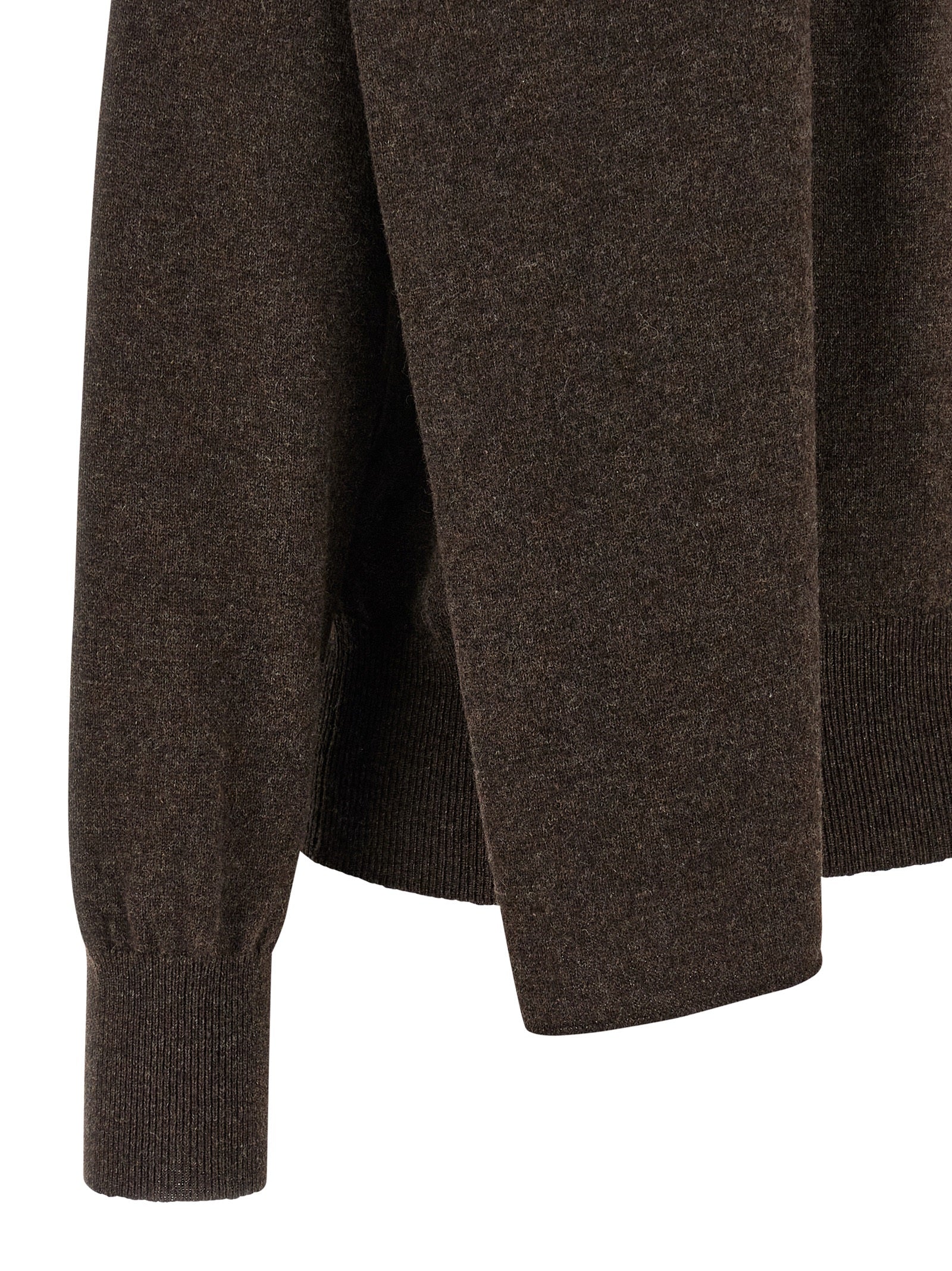 Indulge in the Ferragamo Brown Cashmere Cardigan, a luxurious blend of 100% cashmere and exquisite craftsmanship, perfect for elevating your timeless elegance.