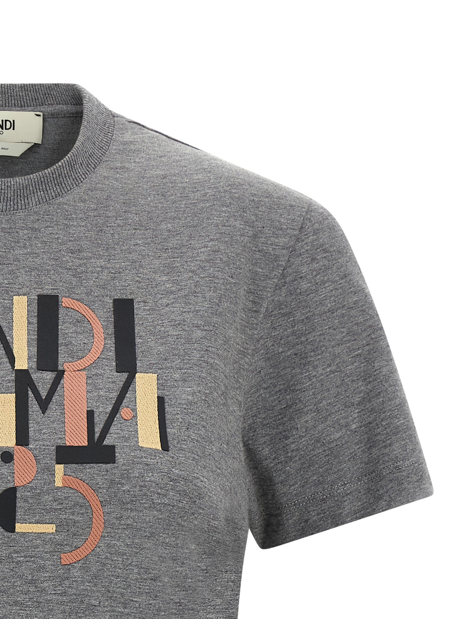 Elevate your style with the Fendi Gray Cotton T-Shirt, a luxurious blend of comfort and sophistication, embodying timeless elegance and exquisite Italian craftsmanship.