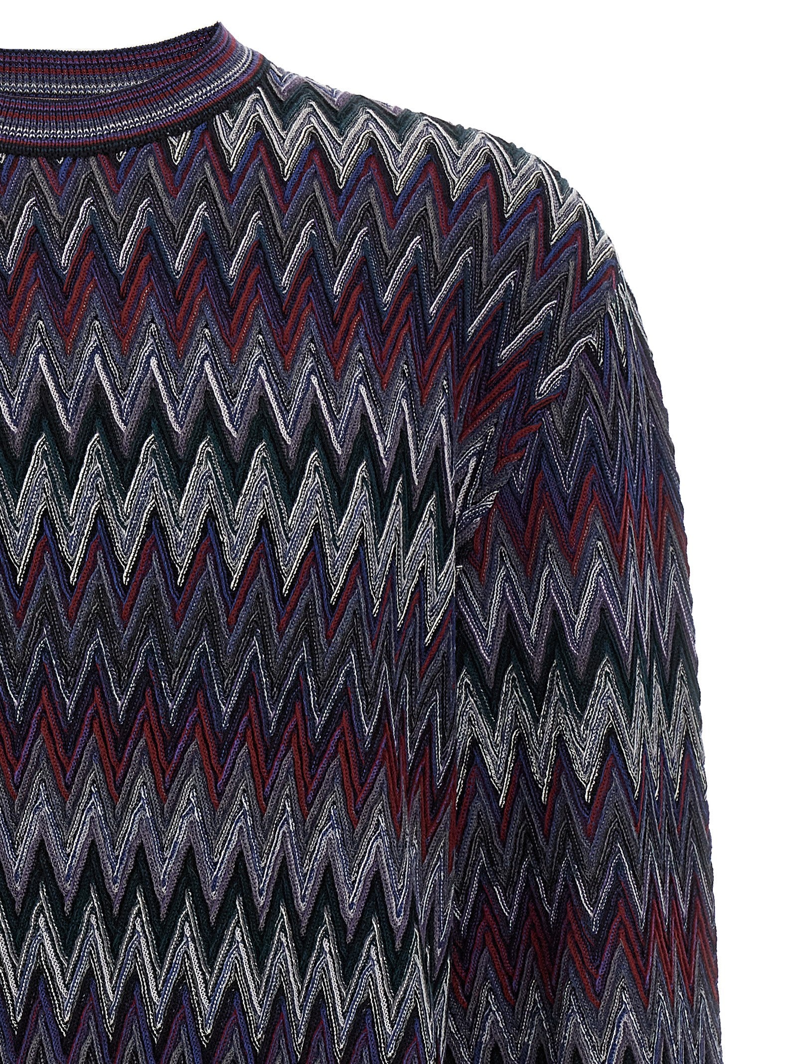 Indulge in the Missoni Blue Wool Cardigan, a masterpiece of Italian craftsmanship featuring a bold zigzag pattern, perfect for those who embody luxury and sophistication.