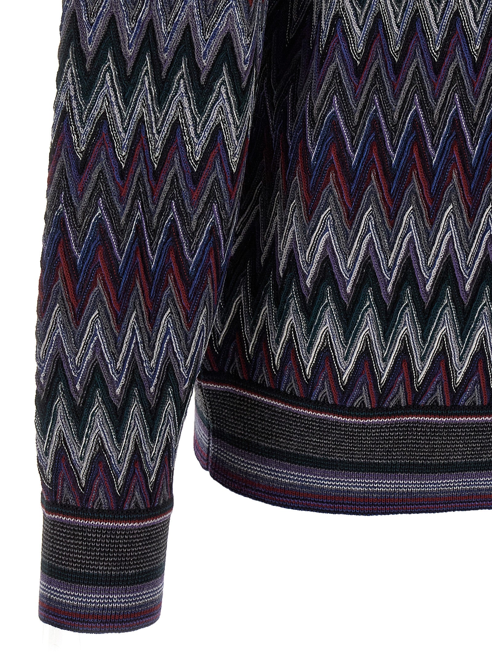 Indulge in the Missoni Blue Wool Cardigan, a masterpiece of Italian craftsmanship, featuring a bold zigzag pattern that elevates your style with luxurious warmth and sophistication.