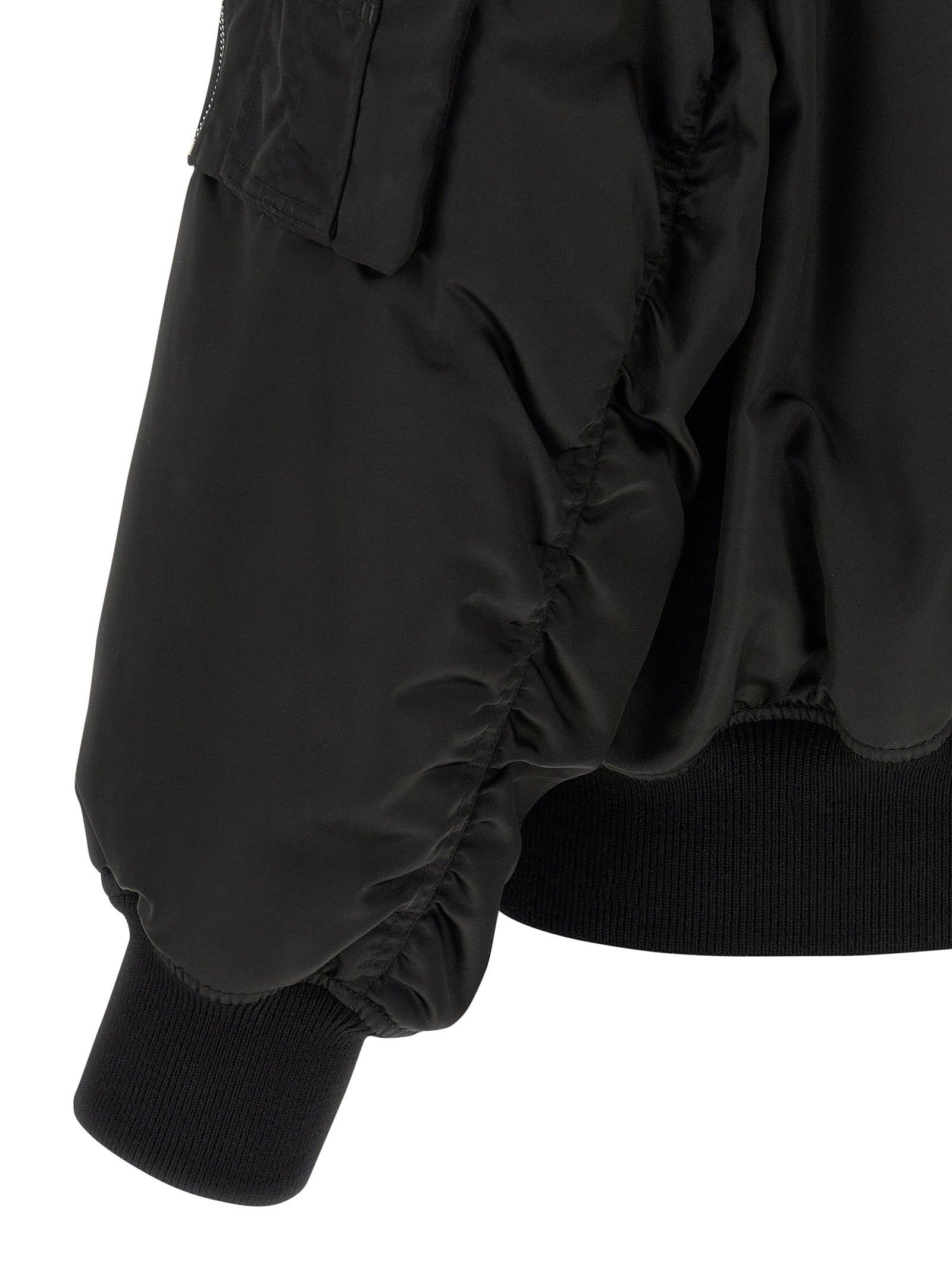 Elevate your wardrobe with the Saint Laurent Black Polyamide Bomber, a luxurious Italian-crafted statement piece that embodies modern sophistication and timeless elegance.