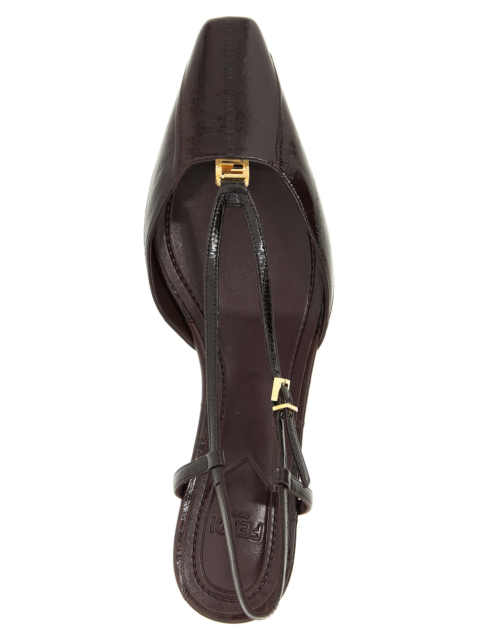 Step into a realm of sophistication with Fendi's Brown Lamb Leather Mid Heel Pumps, where exquisite craftsmanship meets timeless elegance for the discerning individual.