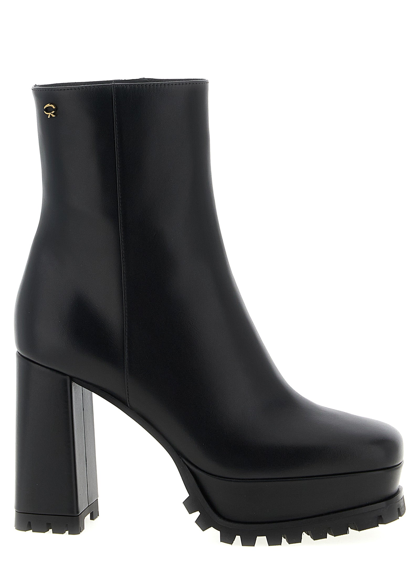 Step into unparalleled elegance with Gianvito Rossi's Harlem Black Calfskin Ankle Boots, crafted for the discerning individual who values sophistication and style.