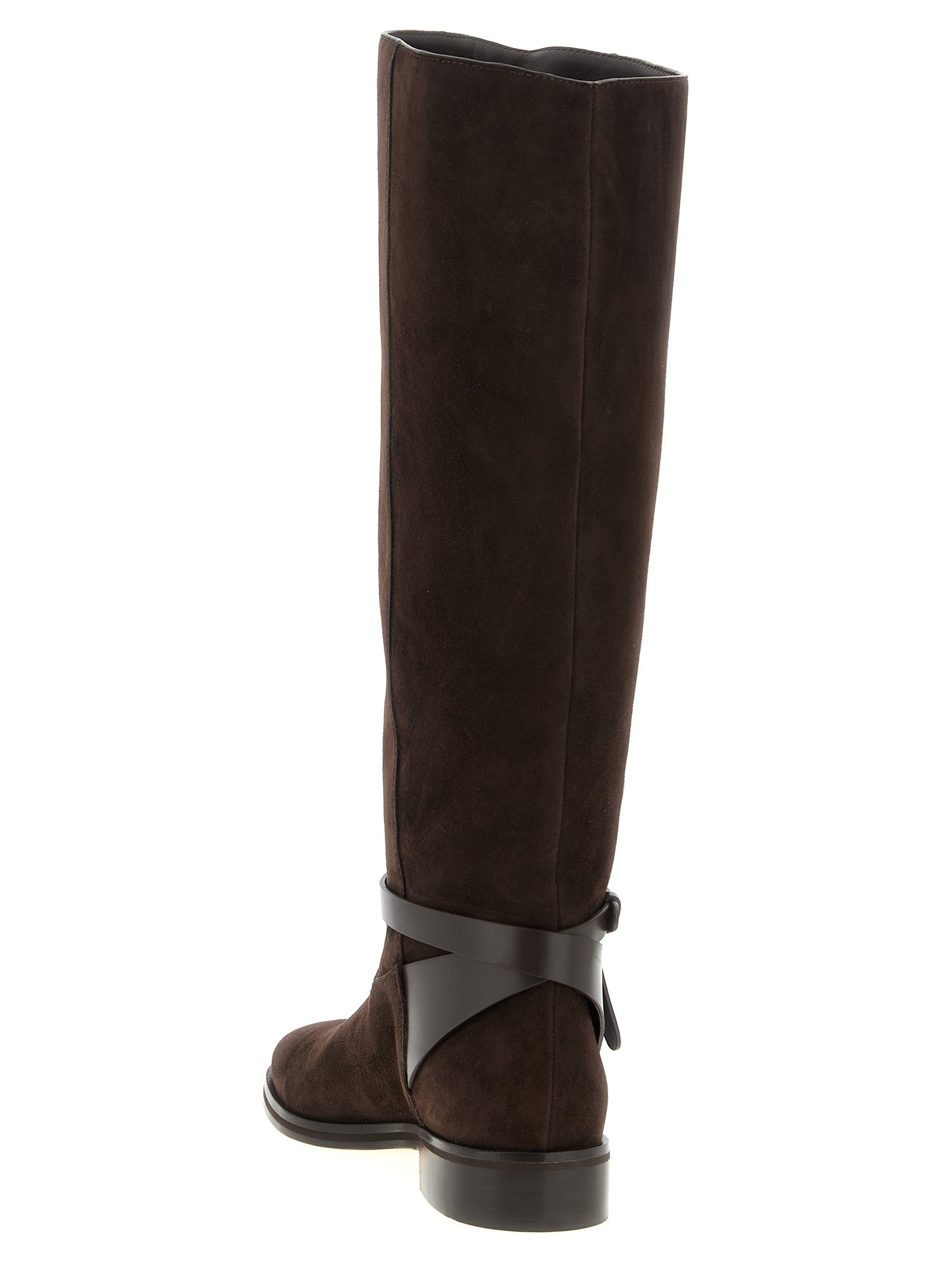 Indulge in the exquisite Jimmy Choo Brown Leather Over The Knee boots, a masterpiece of Italian craftsmanship that elevates your style with timeless elegance and luxurious allure.