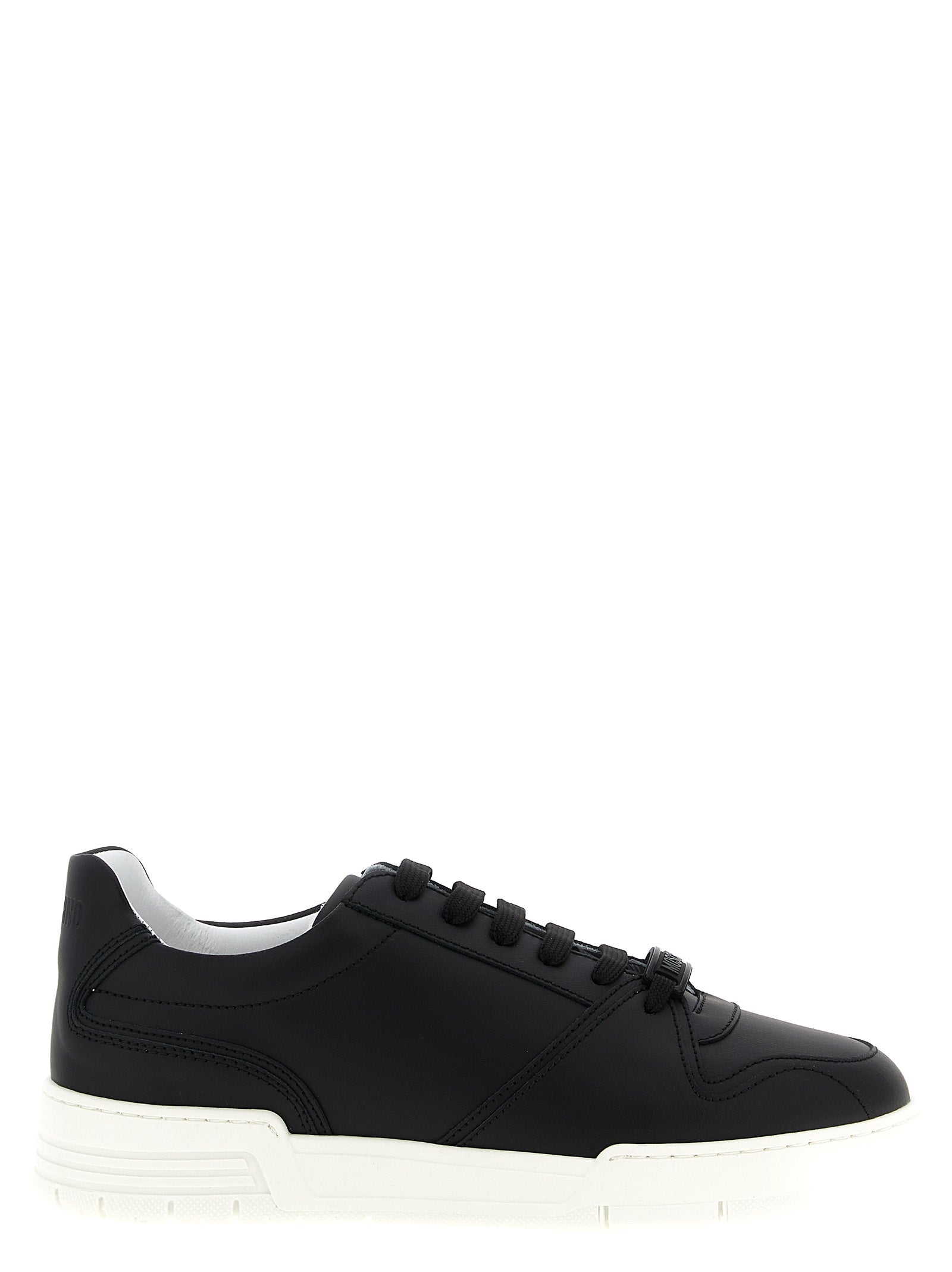 Step into the realm of luxury with Moschino Black Leather Low Top Sneakers, where Italian craftsmanship meets timeless elegance for the discerning individual.