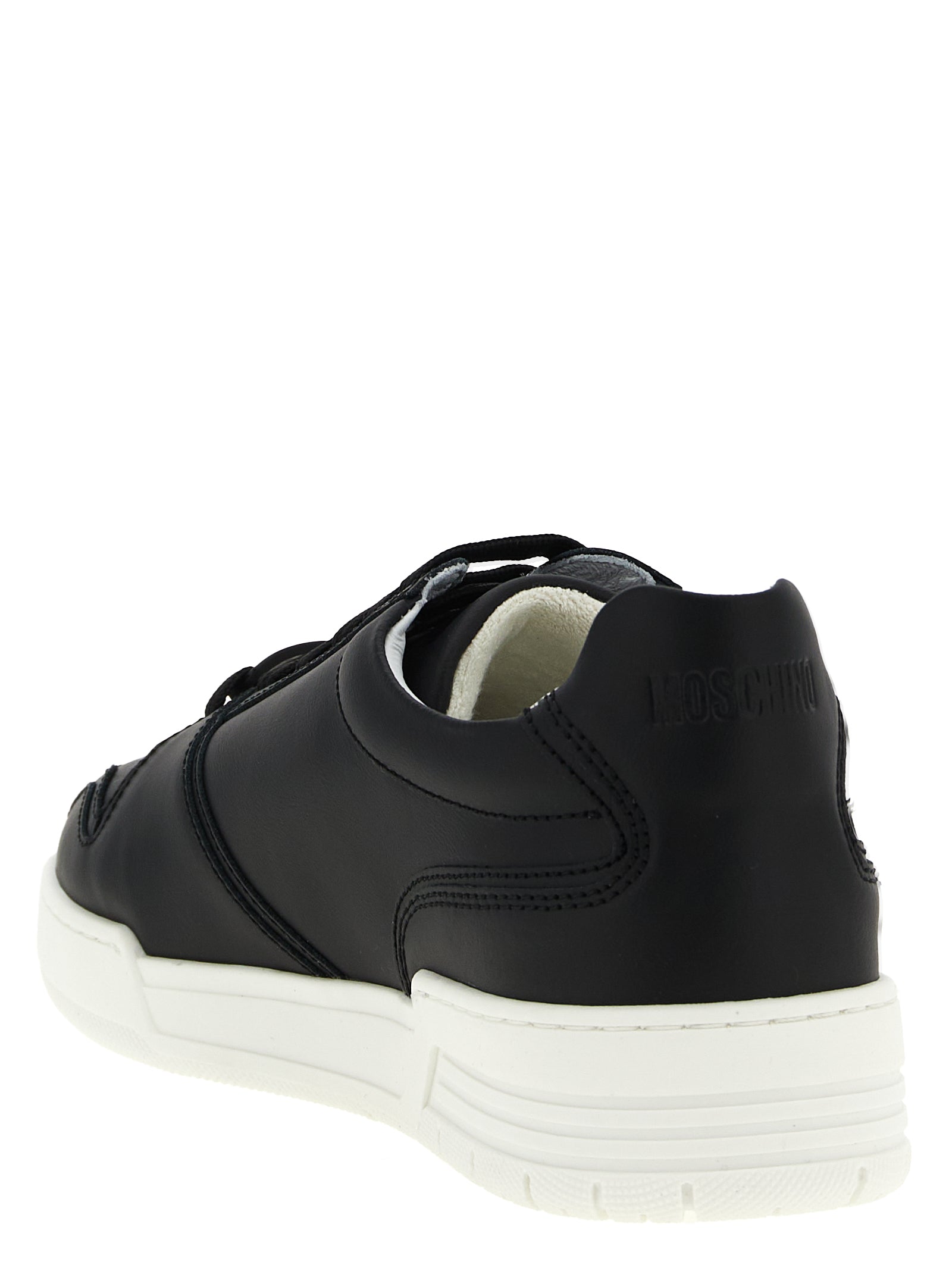 Elevate your style with Moschino Black Leather Low Top Sneakers, where Italian craftsmanship meets luxurious design, perfect for the discerning individual.