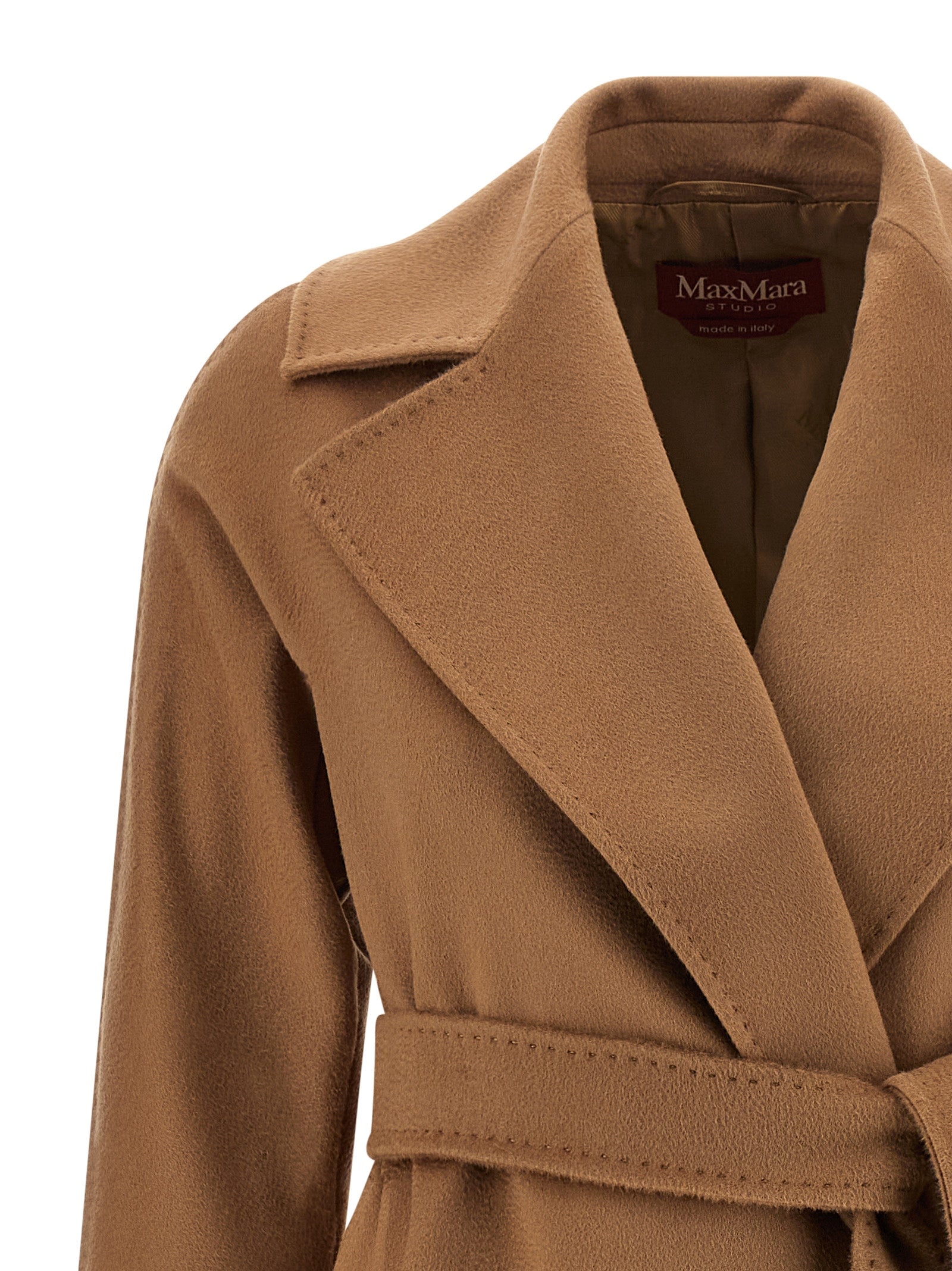 Indulge in the exquisite Max Mara Dravenna coat, crafted from luxurious virgin wool, embodying timeless elegance and sophisticated allure for the discerning wardrobe.