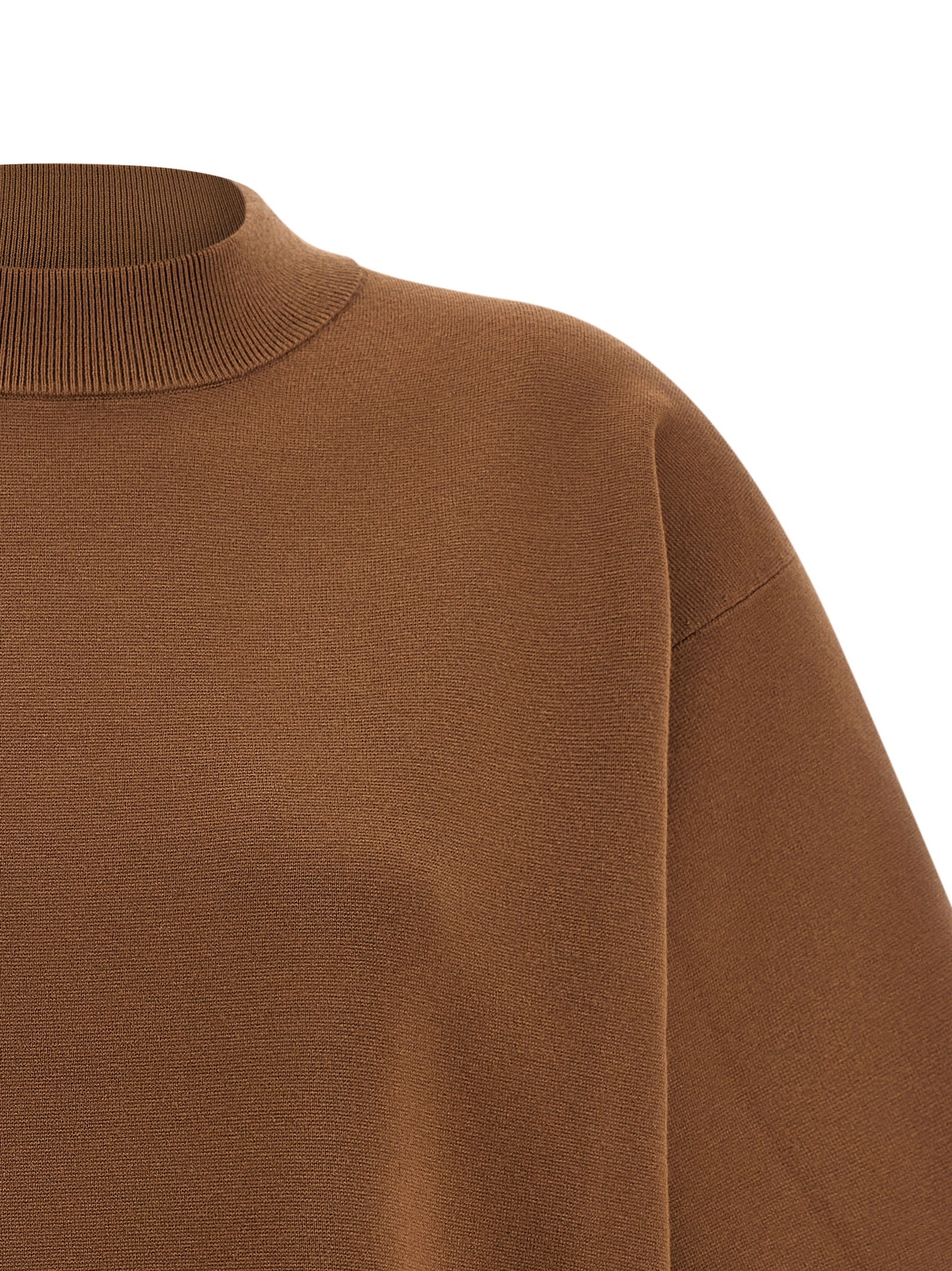 Elevate your wardrobe with the Max Mara Brown Viscose Cardigan, a luxurious blend of 72% viscose and 28% polyester, embodying timeless elegance and refined craftsmanship.