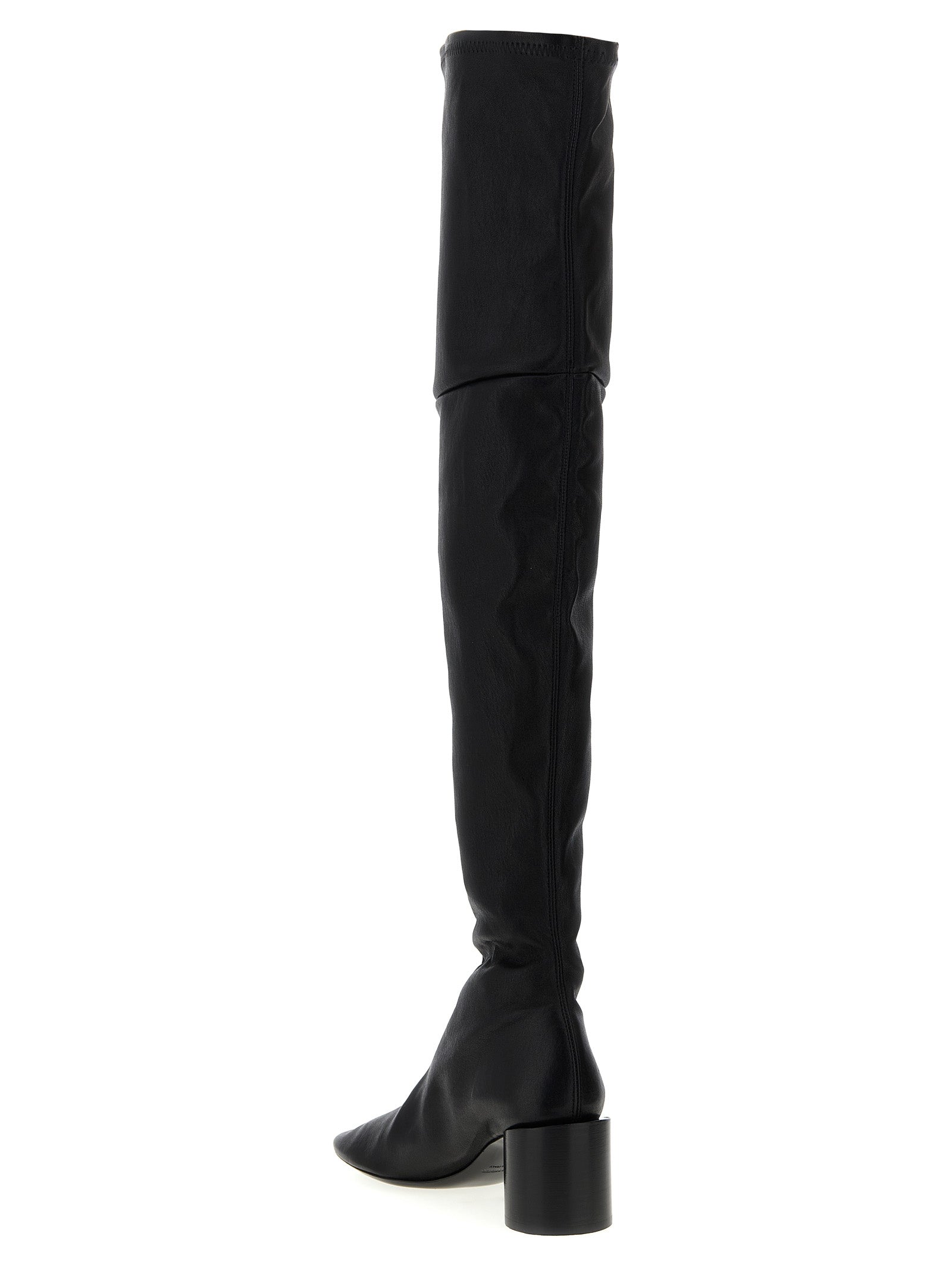 Indulge in the exquisite allure of Jil Sander's Black Leather Over The Knee boots, crafted in Italy from luxurious stretch nappa leather, embodying artisanal elegance and sophistication.