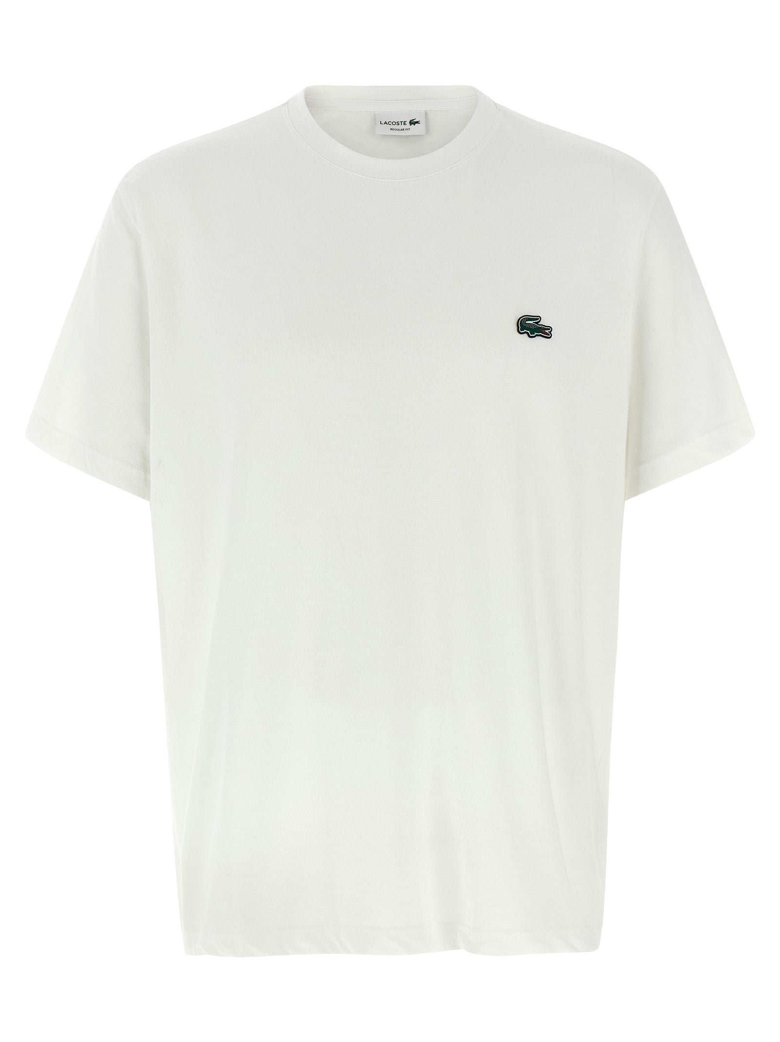 Elevate your wardrobe with the Lacoste White Cotton T-Shirt, a luxurious blend of comfort and style, embodying sophistication for the discerning fashion connoisseur.