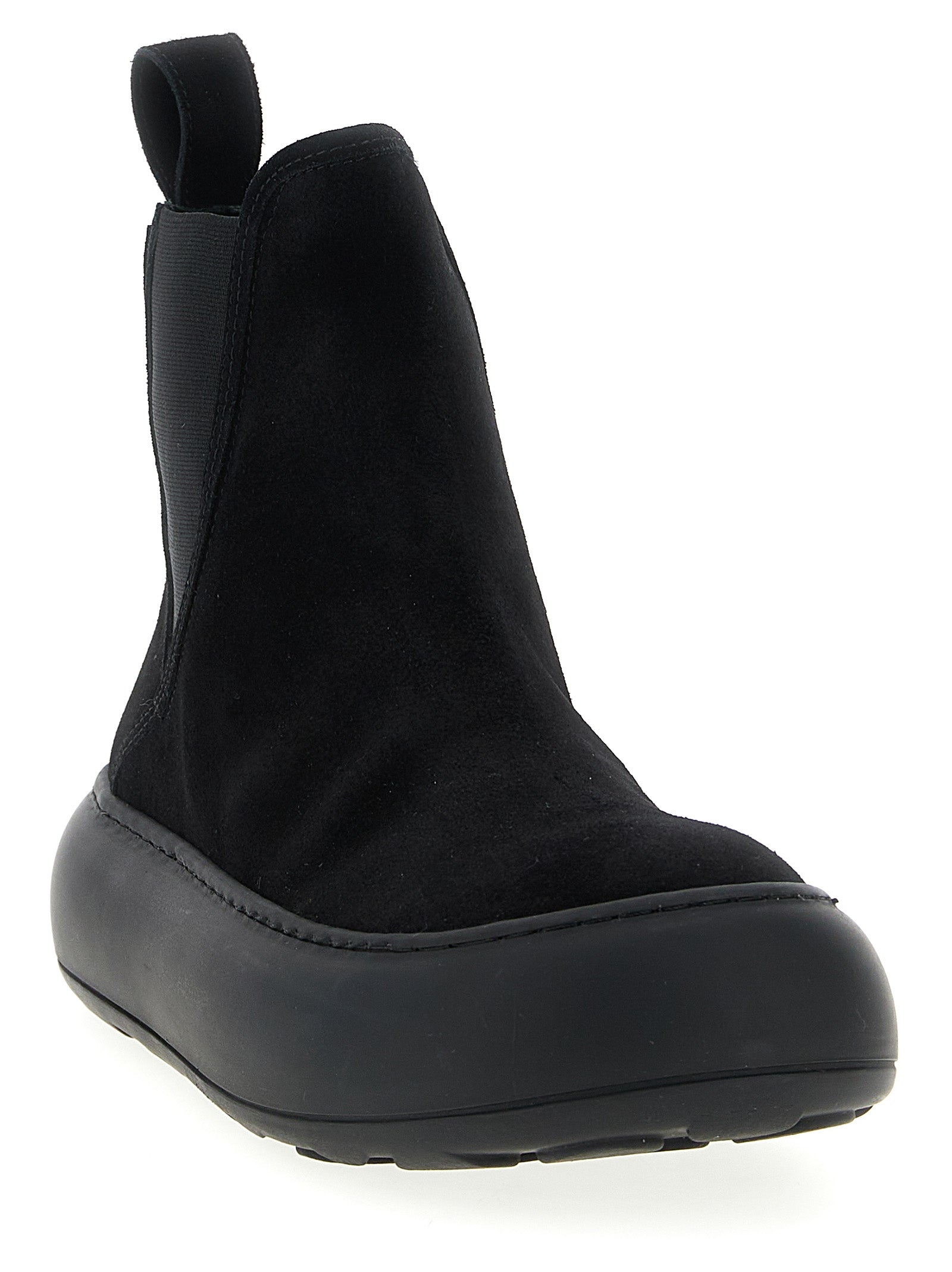Experience the exquisite Moschino Black Calfskin Chelsea Boots, where artisanal craftsmanship meets timeless elegance, elevating your style with every step.