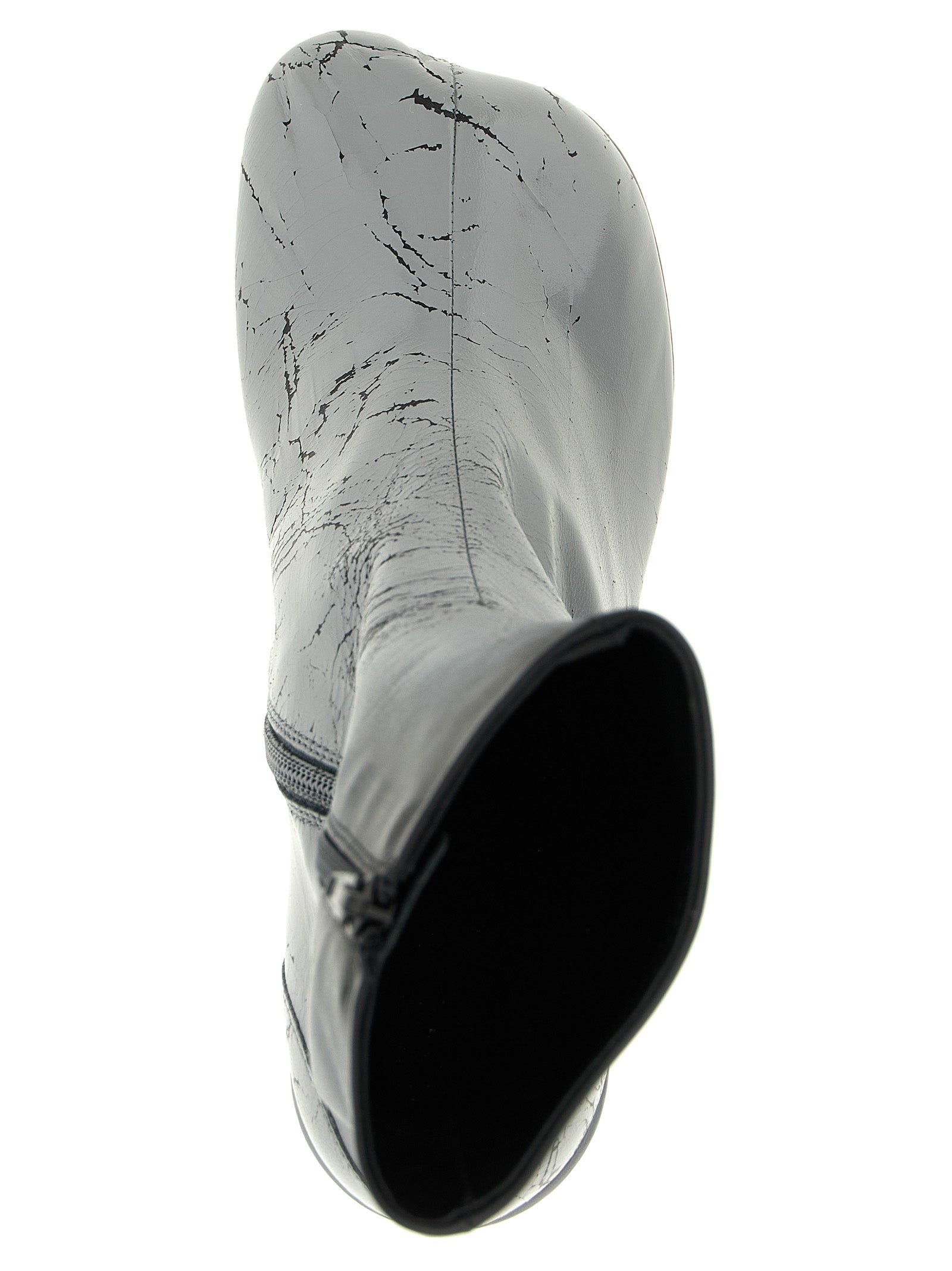 Step into a realm of elegance with MM6 Maison Margiela's Gray Lambskin Ankle Boots, where avant-garde design meets luxurious craftsmanship for the discerning fashion lover.