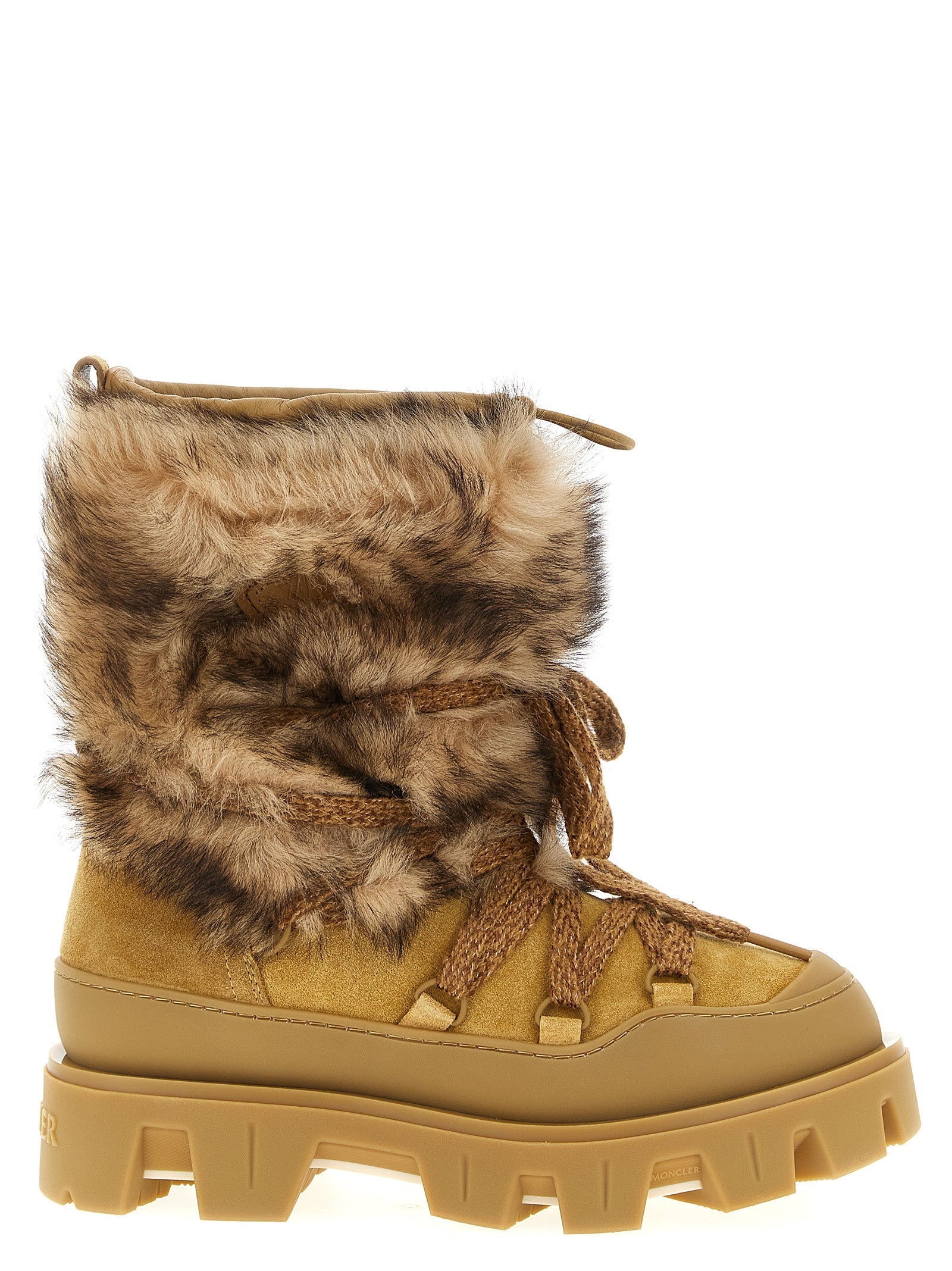 Step into the allure of Moncler's Brown Calfskin Flat Boots, where exquisite craftsmanship meets luxurious comfort, perfect for the discerning individual seeking timeless elegance.