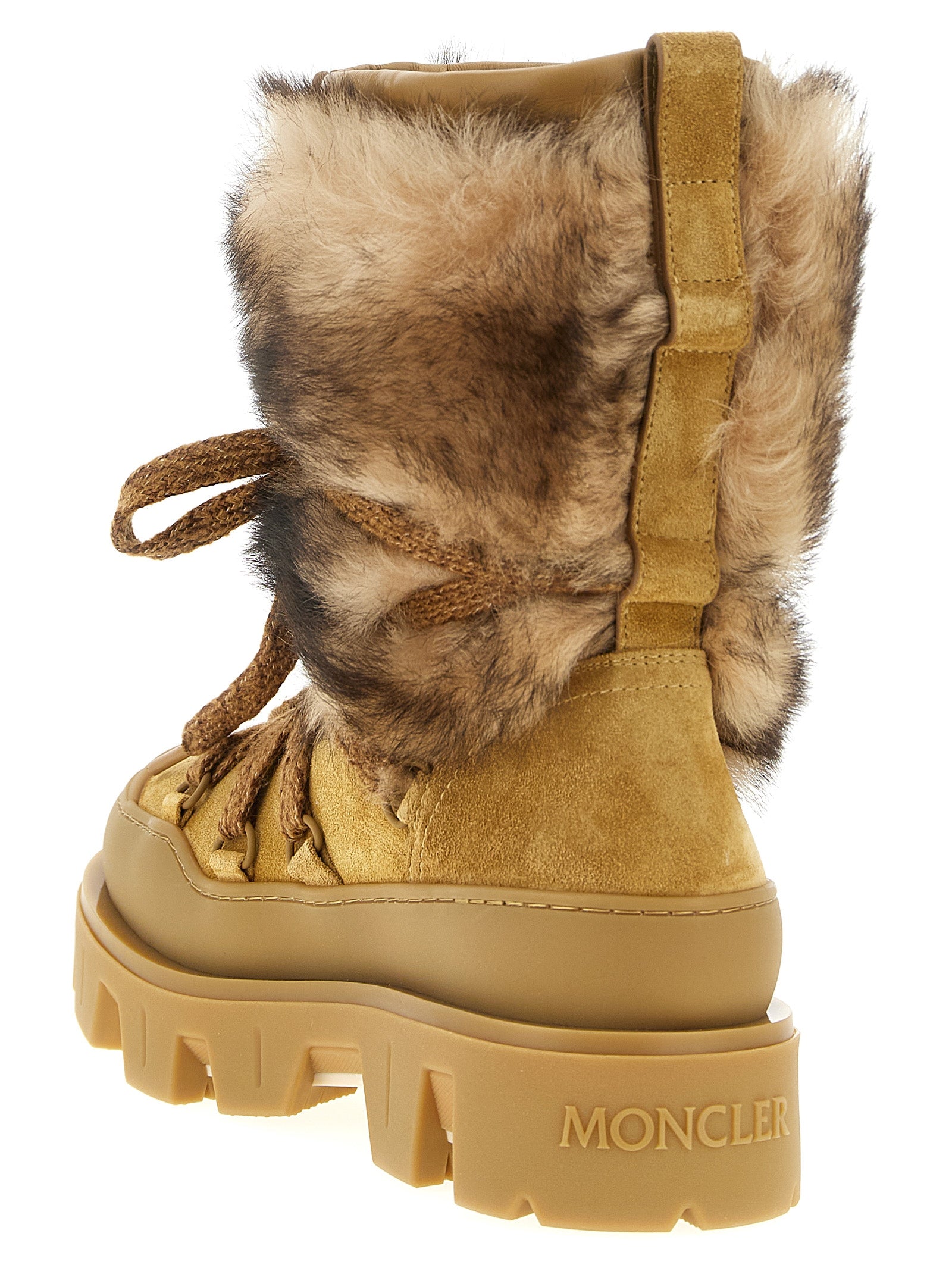 Step into luxury with Moncler's Brown Calfskin Flat Boots, where exquisite craftsmanship meets sophisticated design, perfect for the modern connoisseur.