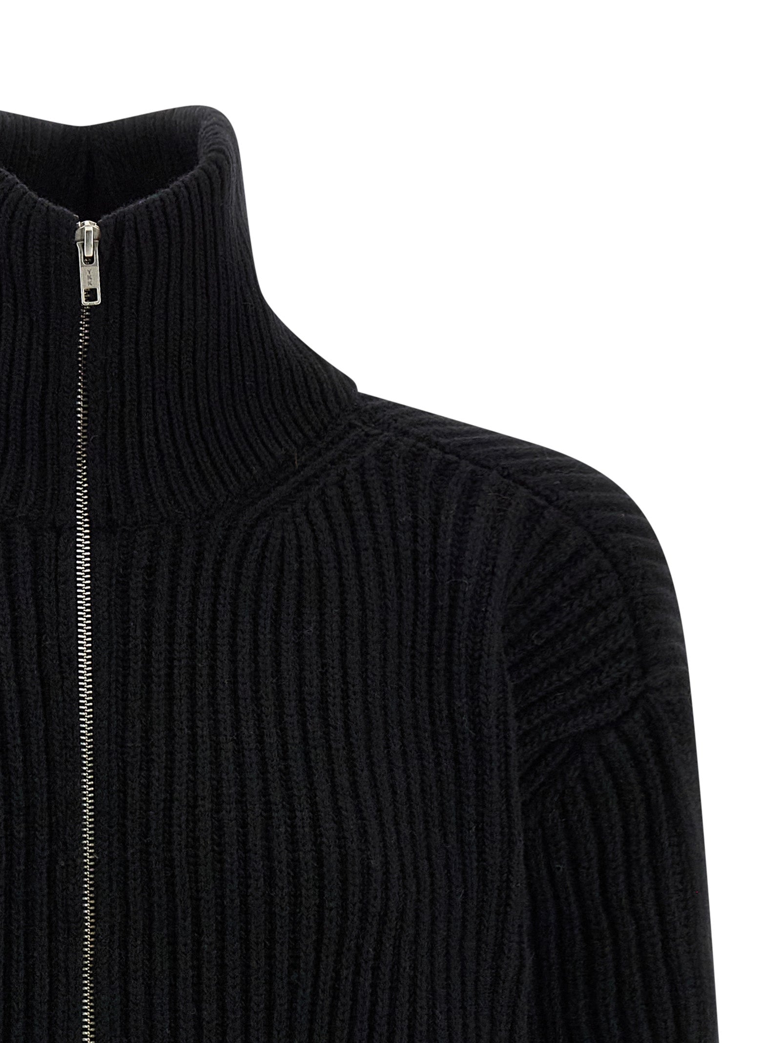 Indulge in the MM6 Maison Margiela Black Wool Short Dress, a fusion of exquisite craftsmanship and luxurious materials, perfect for the discerning fashion connoisseur.