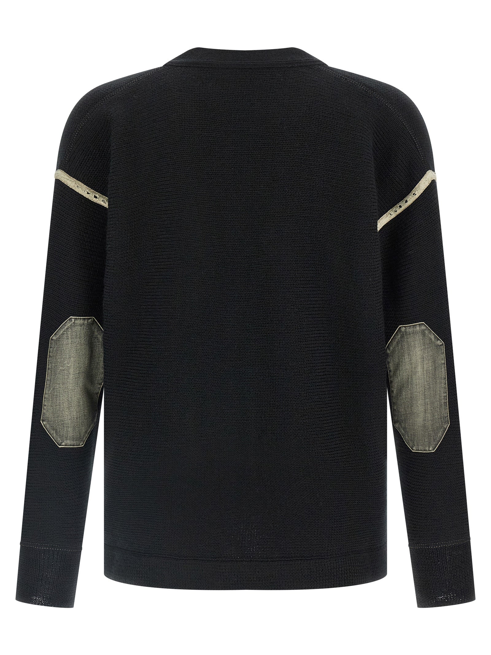Indulge in the Maison Margiela Black Virgin Wool Cardigan, a masterpiece of artisanal luxury, crafted from 100% virgin wool for the discerning individual who appreciates sophistication.