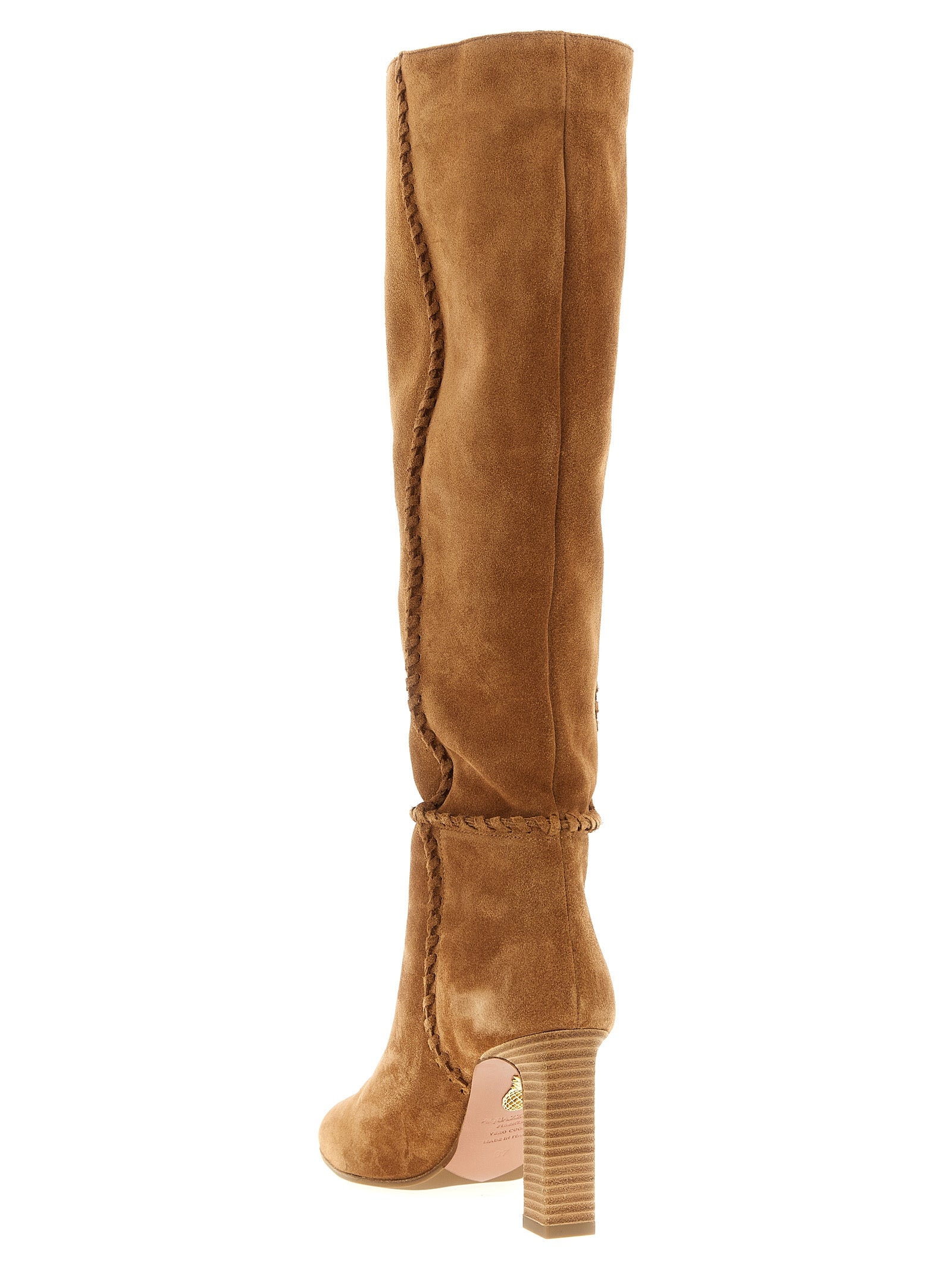 Experience the allure of Aquazzura's Beige Calfskin Over The Knee Boots, where Italian craftsmanship meets timeless elegance, perfect for the discerning fashion connoisseur.