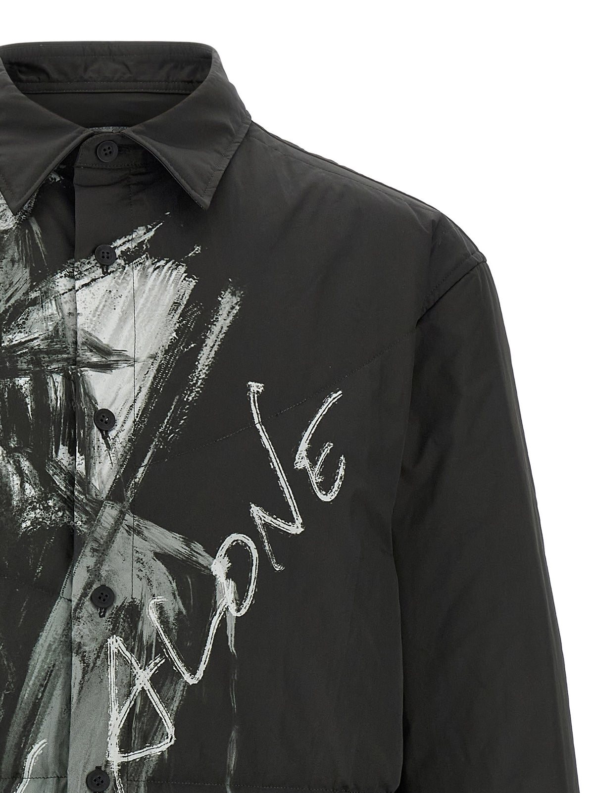 Elevate your wardrobe with the Yohji Yamamoto Black Polyester Blouse, a luxurious blend of avant-garde design and timeless elegance, perfect for making a bold statement.