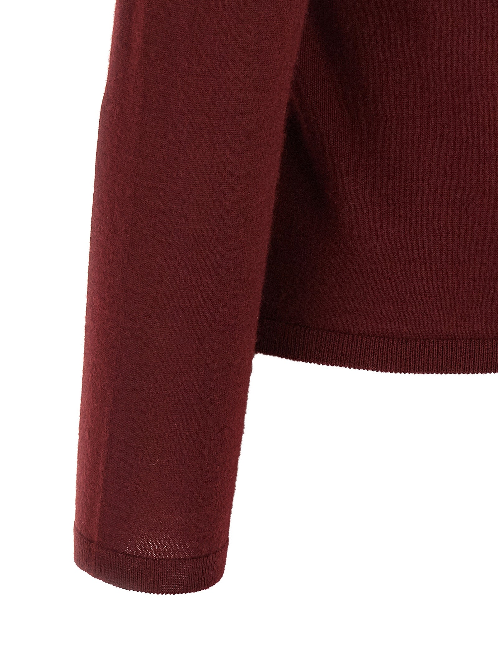 Indulge in the Max Mara Bordeaux Cashmere Cardigan, a masterpiece of 100% cashmere that exudes elegance, sophistication, and timeless allure for every discerning wardrobe.