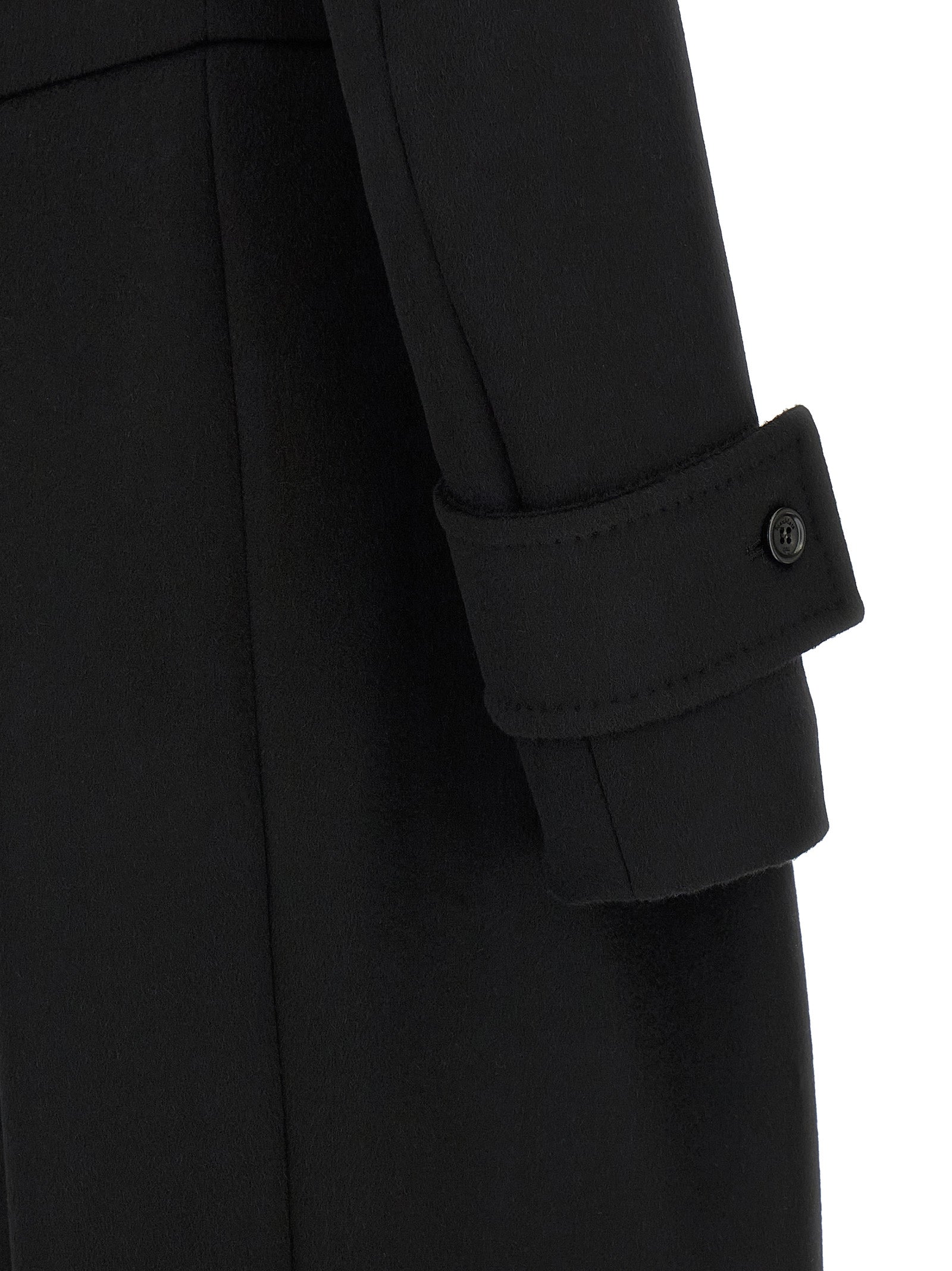 Experience the allure of the Max Mara Black Wool Coat, a masterpiece in 100% camel wool, embodying exquisite Italian craftsmanship and timeless elegance for the discerning.