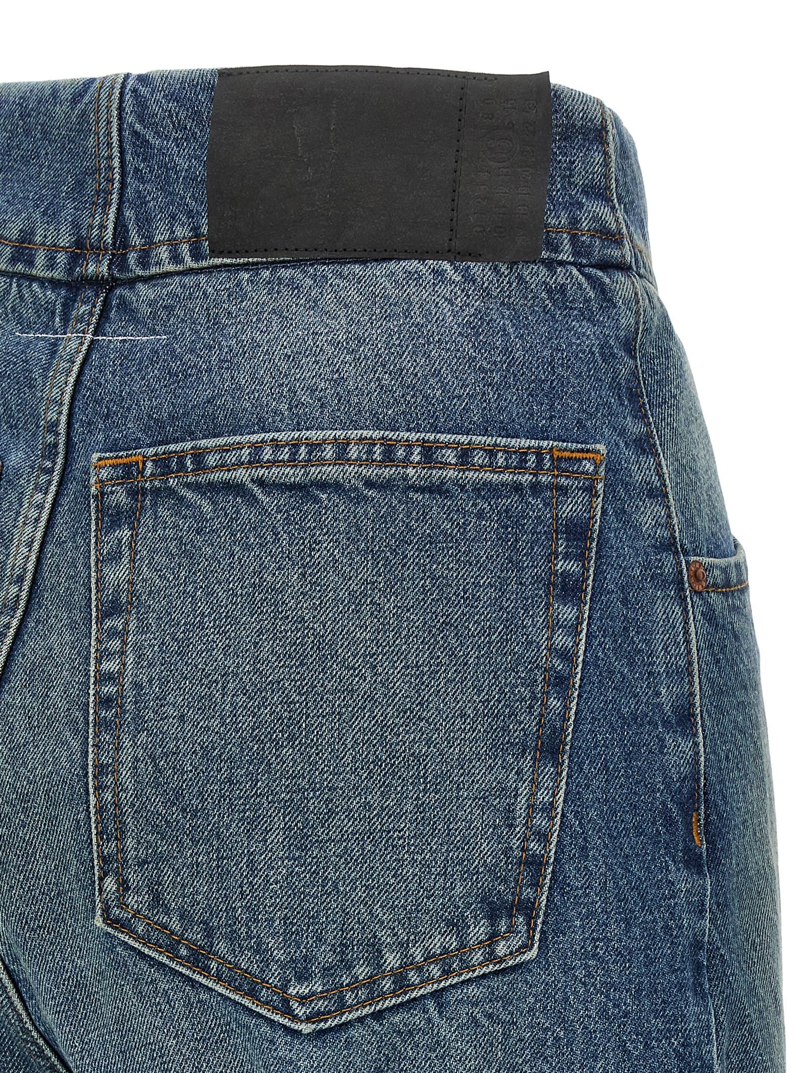 Indulge in the elegance of MM6 Maison Margiela's Blue Cotton Straight-Leg Jeans, crafted from premium stonewashed denim for a timeless, luxurious silhouette.