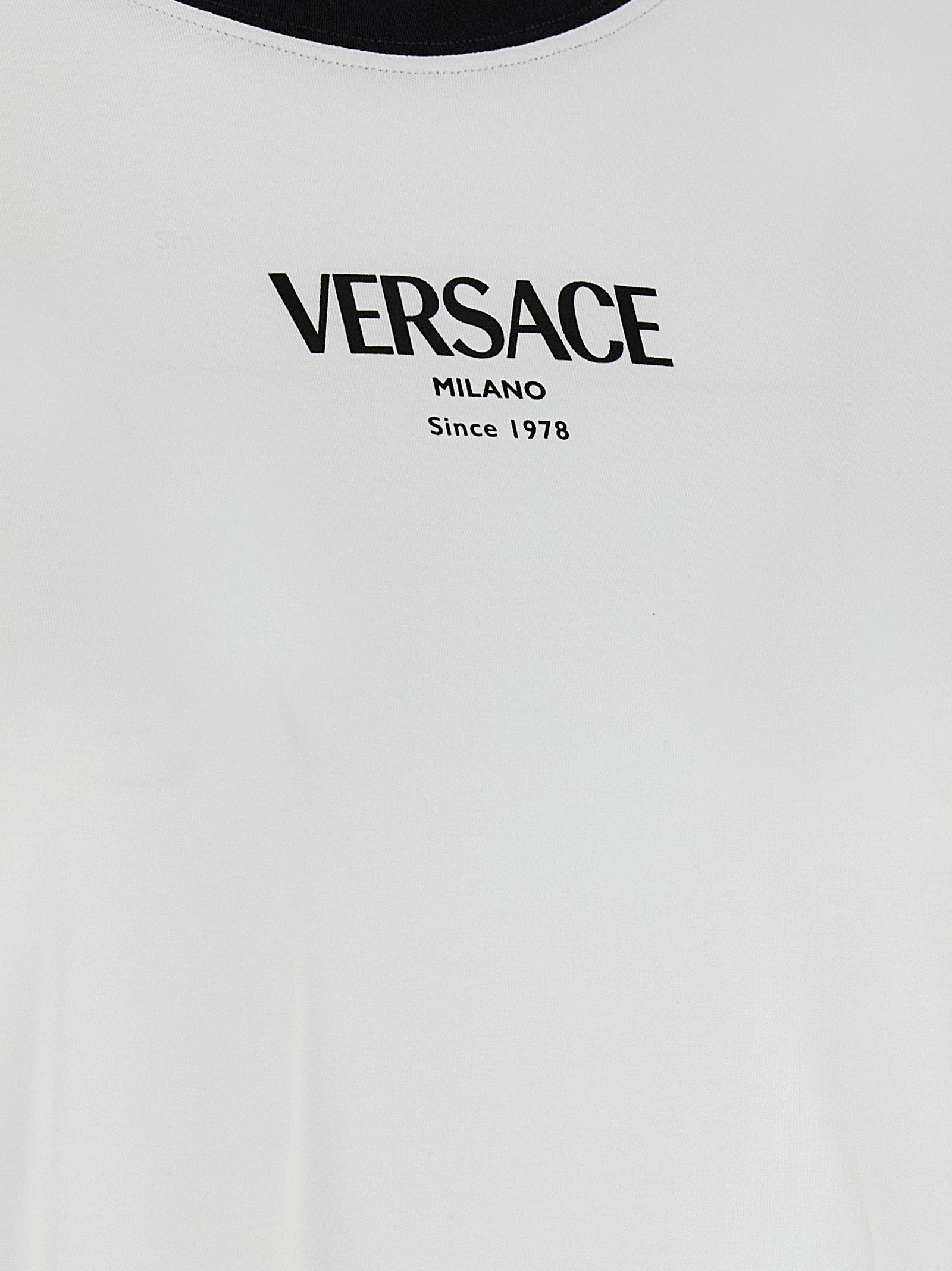 Elevate your style with the Versace Bicolor Viscose T-Shirt, a luxurious blend of comfort and sophistication, embodying Italian craftsmanship and timeless elegance.