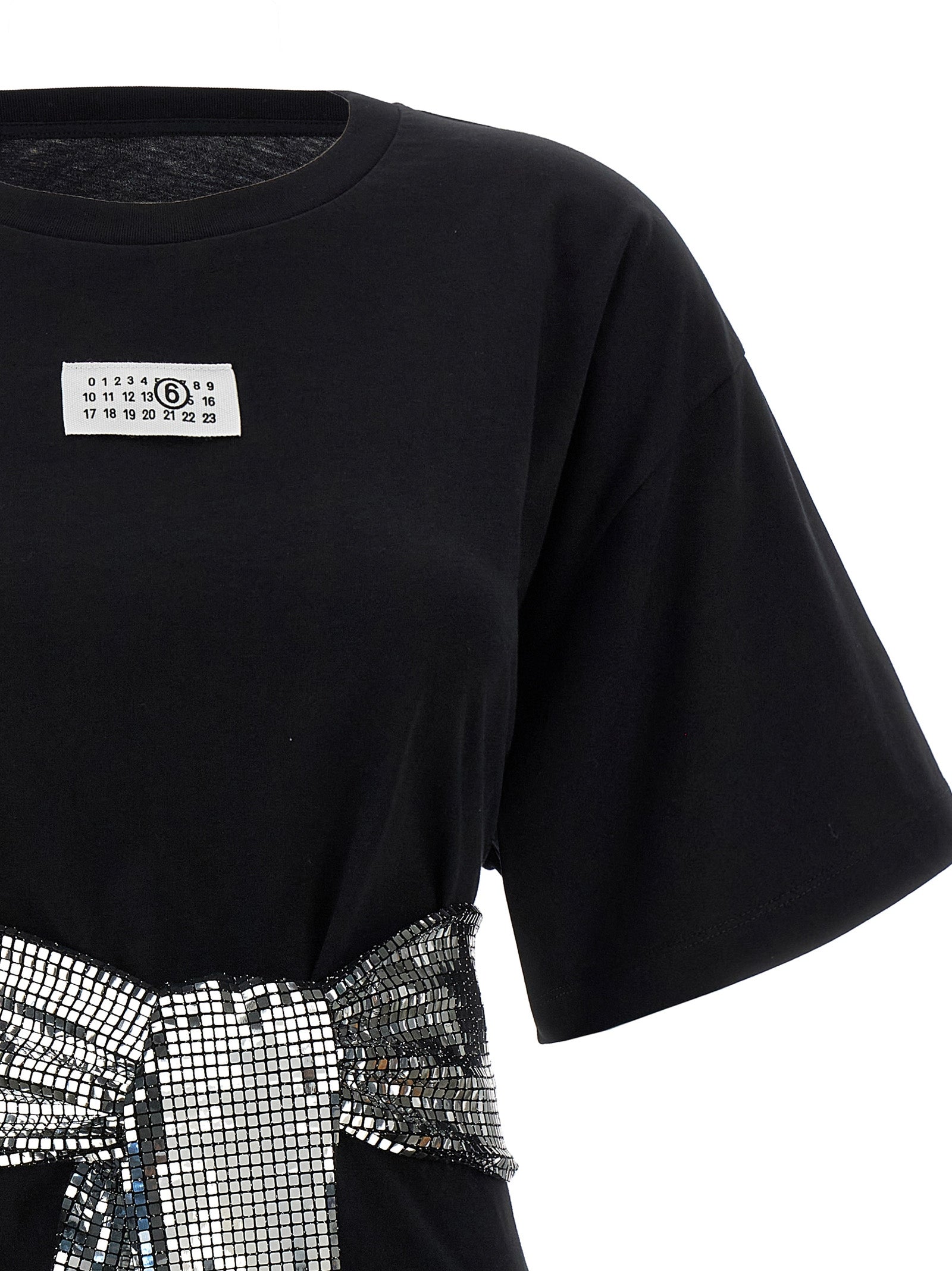 Discover the MM6 Maison Margiela Black Cotton T-Shirt, where artisanal luxury meets bold design, perfect for expressing your unique style with elegance.