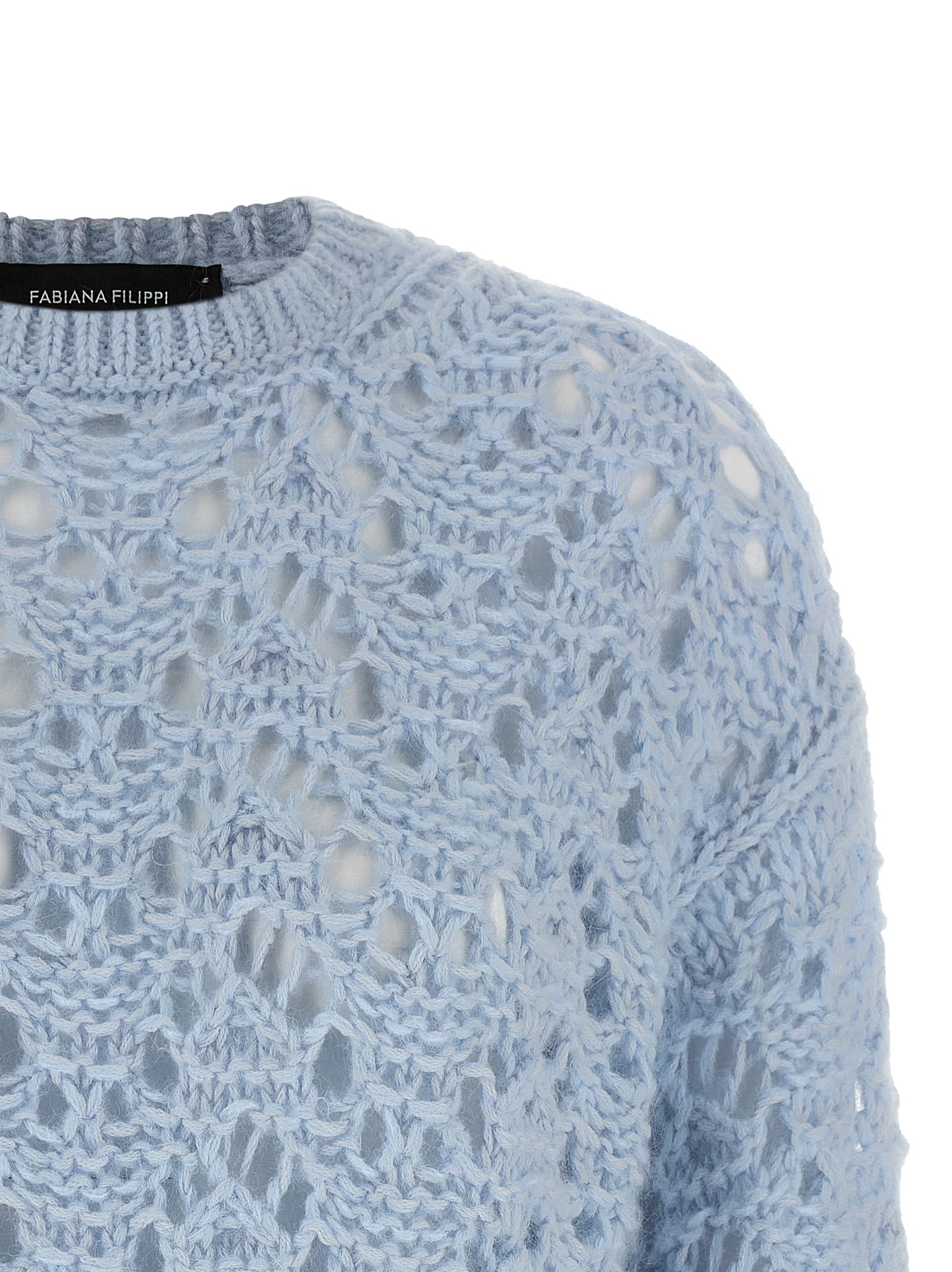 Elevate your wardrobe with the Fabiana Filippi Blue Virgin Wool Cardigan, a luxurious blend of fine materials, embodying artisanal elegance for the discerning individual.