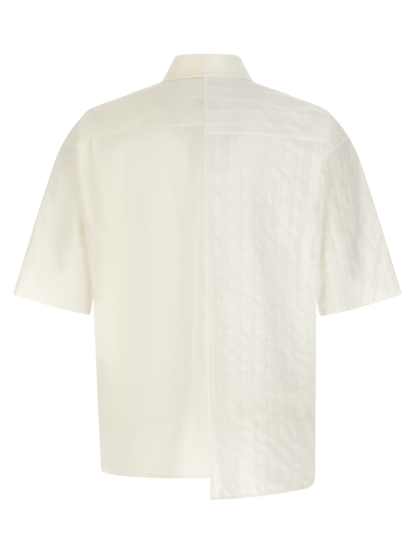 Experience the allure of the MM6 Maison Margiela White Cotton Blouse, where luxurious Italian craftsmanship meets modern elegance in an asymmetric design, perfect for the discerning individual.