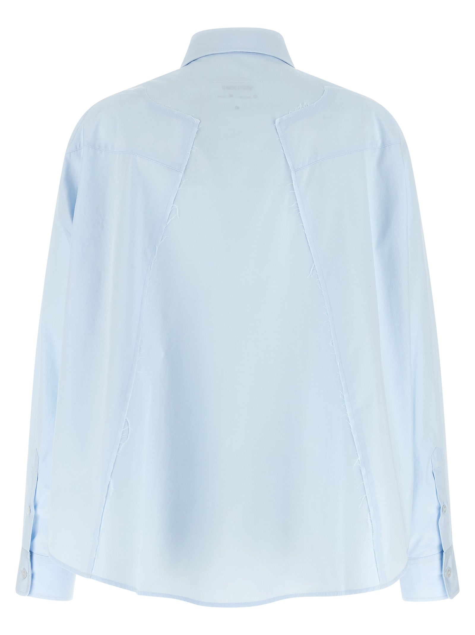 Elevate your wardrobe with the MM6 Maison Margiela Blue Cotton Blouse, a masterpiece of artisanal elegance, featuring luxurious cotton poplin and contemporary design.