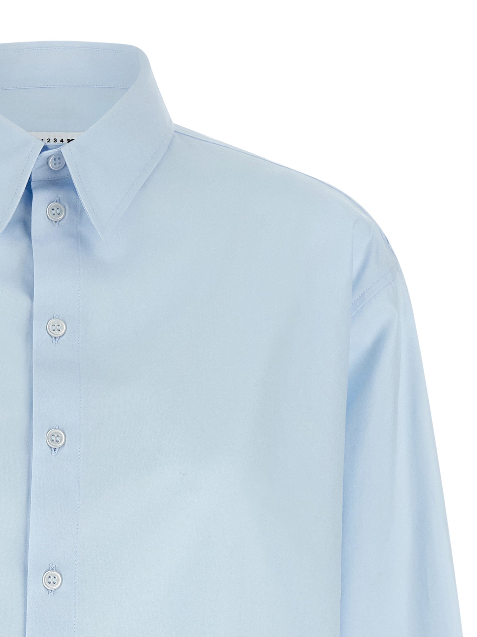 Elevate your wardrobe with the MM6 Maison Margiela Blue Cotton Blouse, a masterpiece of artisanal elegance crafted from luxurious cotton poplin, perfect for discerning tastes.