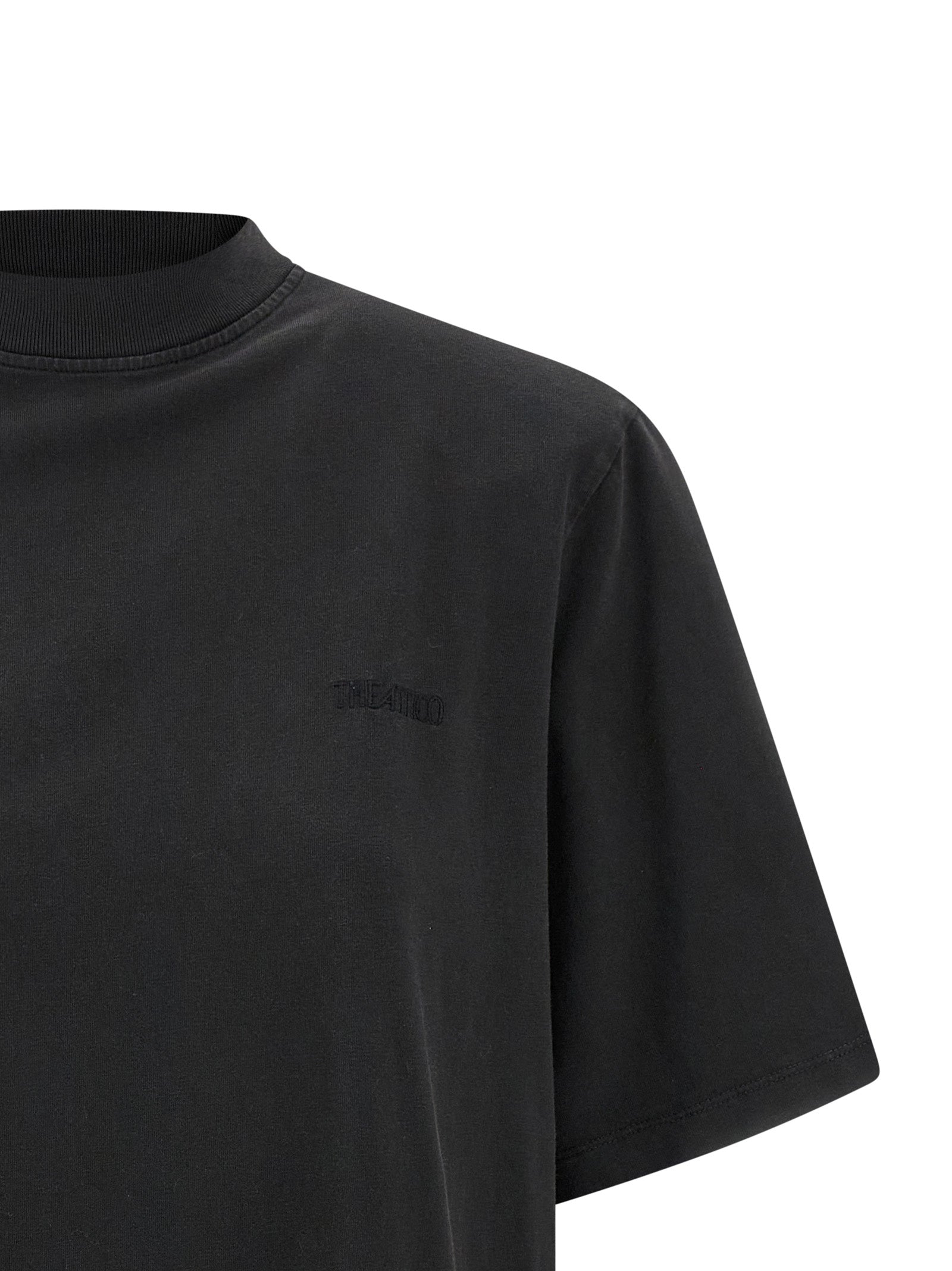 Elevate your wardrobe with The Attico Black Cotton T-Shirt, a luxurious blend of comfort and sophistication, crafted in Portugal for the discerning individual.