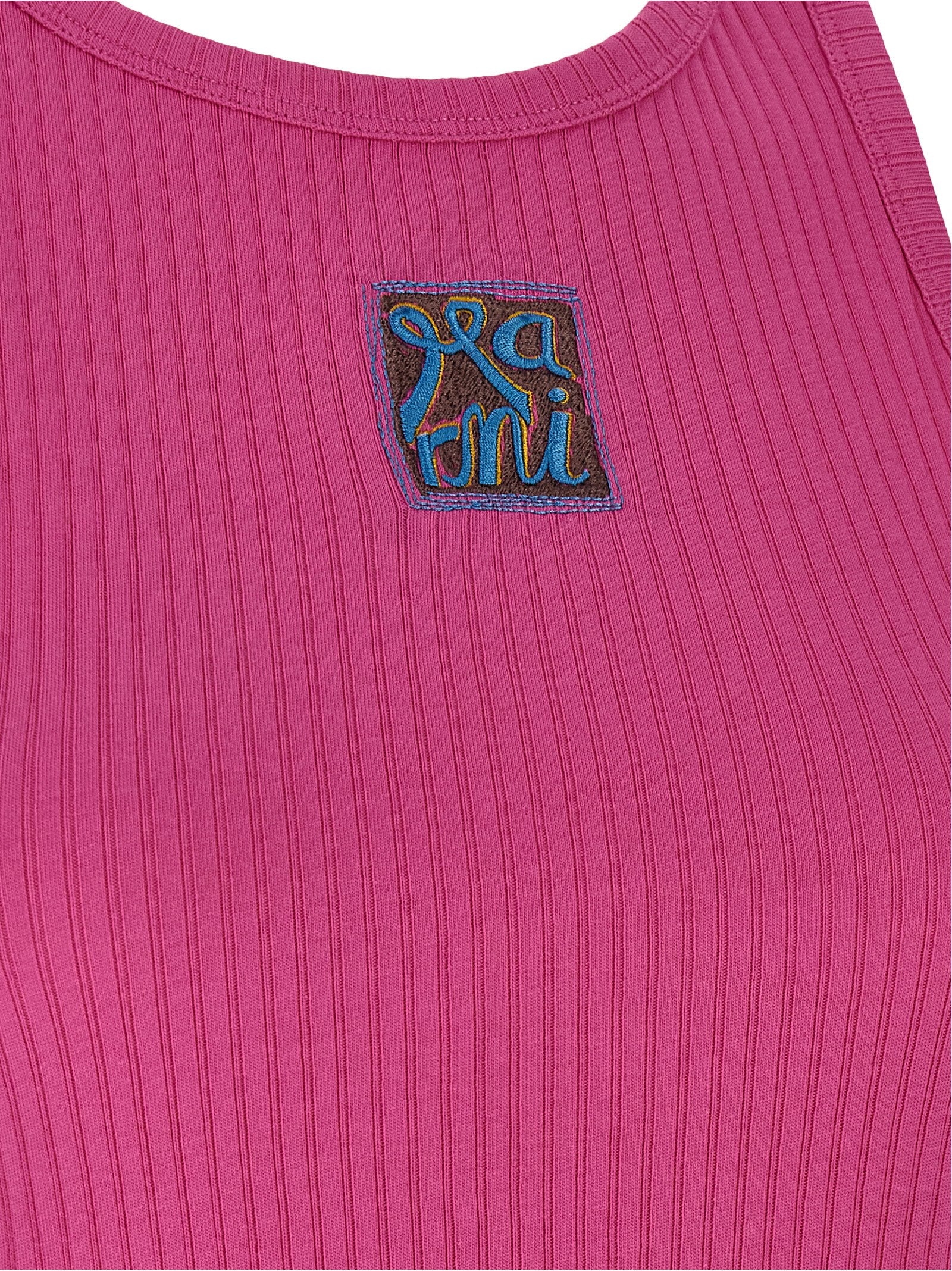 Elevate your style with the Marni Fuchsia Cotton Sleeveless T-Shirt, a luxurious statement piece crafted in Italy, embodying exquisite artistry and vibrant elegance.