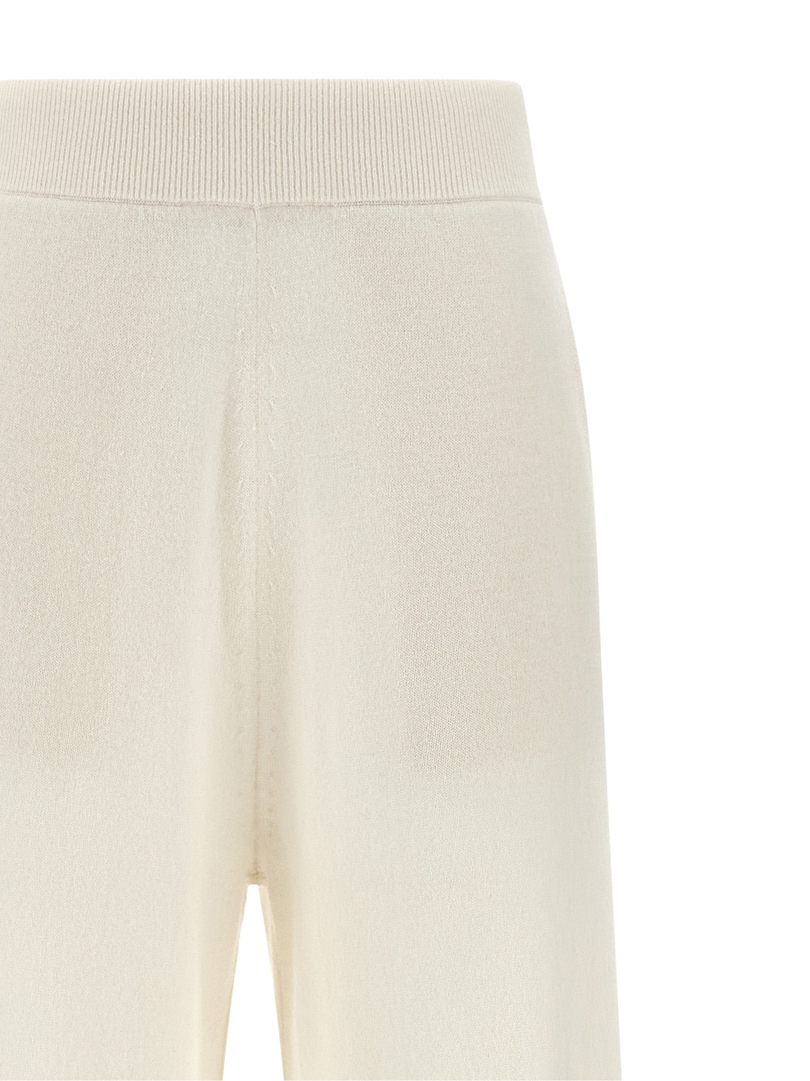 Experience the allure of Max Mara's White Cashmere Casual Pants, where artisanal luxury meets effortless sophistication, crafted from sumptuous 100% cashmere for timeless elegance.