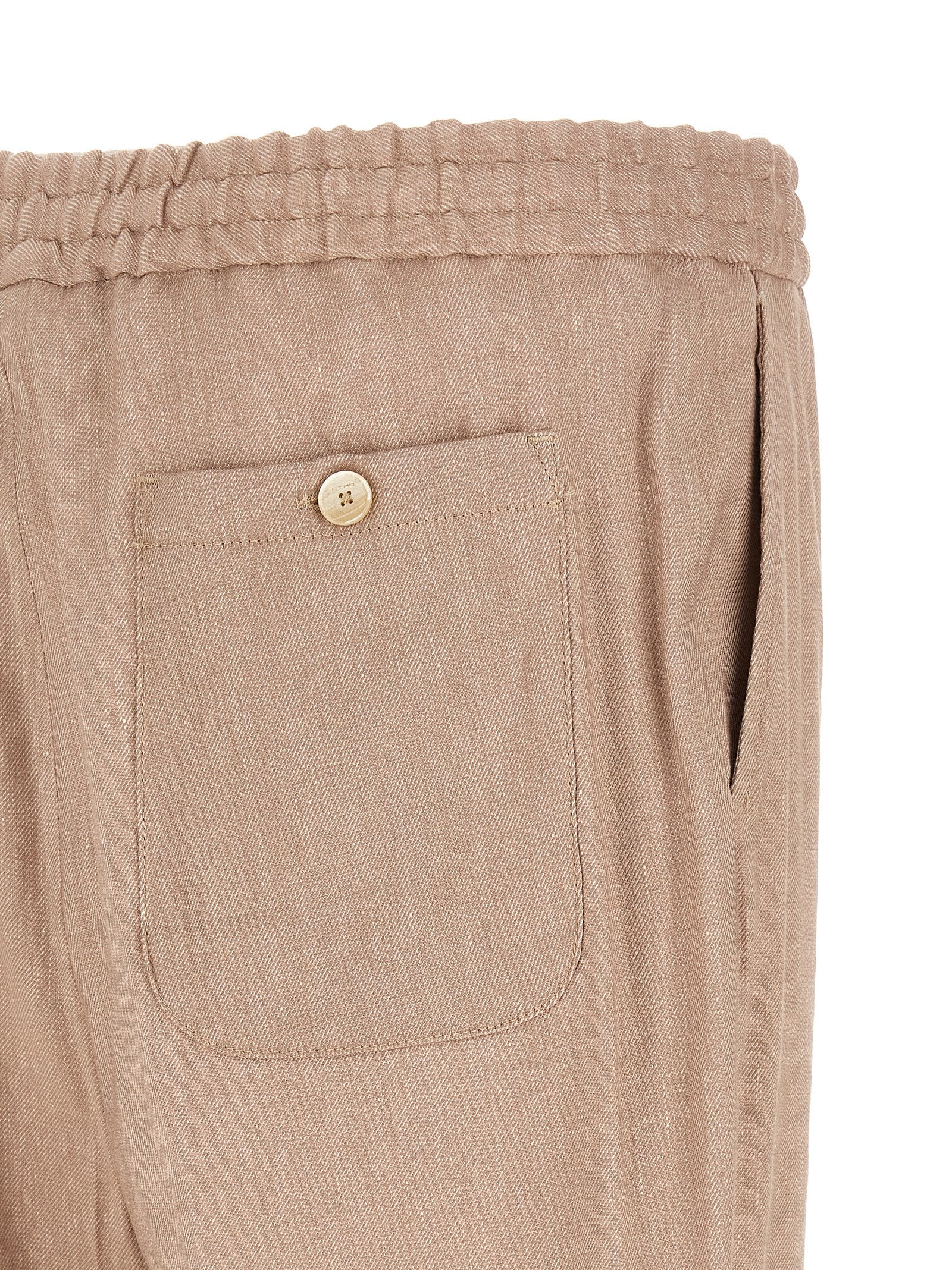 Elevate your wardrobe with Etro Beige Linen Joggers, a luxurious blend of linen and viscose, embodying artisanal craftsmanship for the discerning trendsetter.