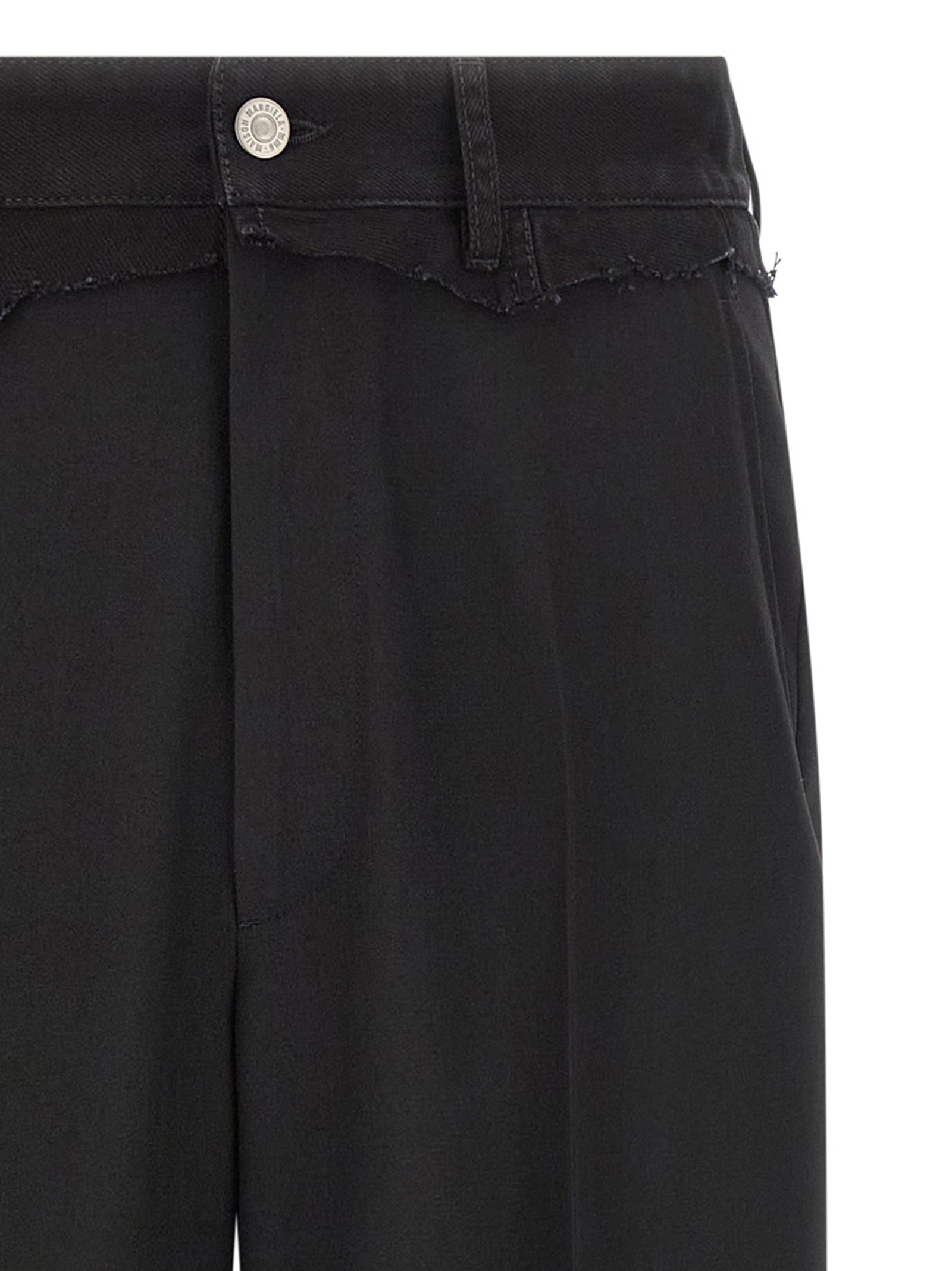 Discover the artisanal elegance of MM6 Maison Margiela's Black Polyester Casual Pants, crafted in Italy with a luxurious blend of 55% polyester and 45% virgin wool, embodying sophistication and avant-garde design.