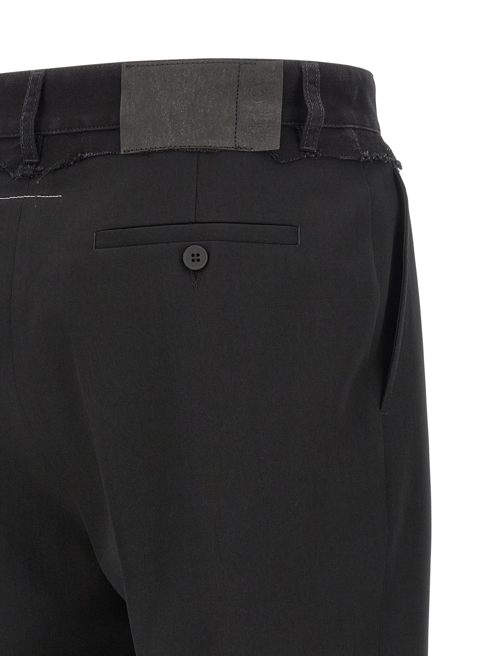 Indulge in the artisanal elegance of MM6 Maison Margiela's Black Polyester Casual Pants, where luxurious materials and avant-garde design redefine sophistication for the discerning individual.