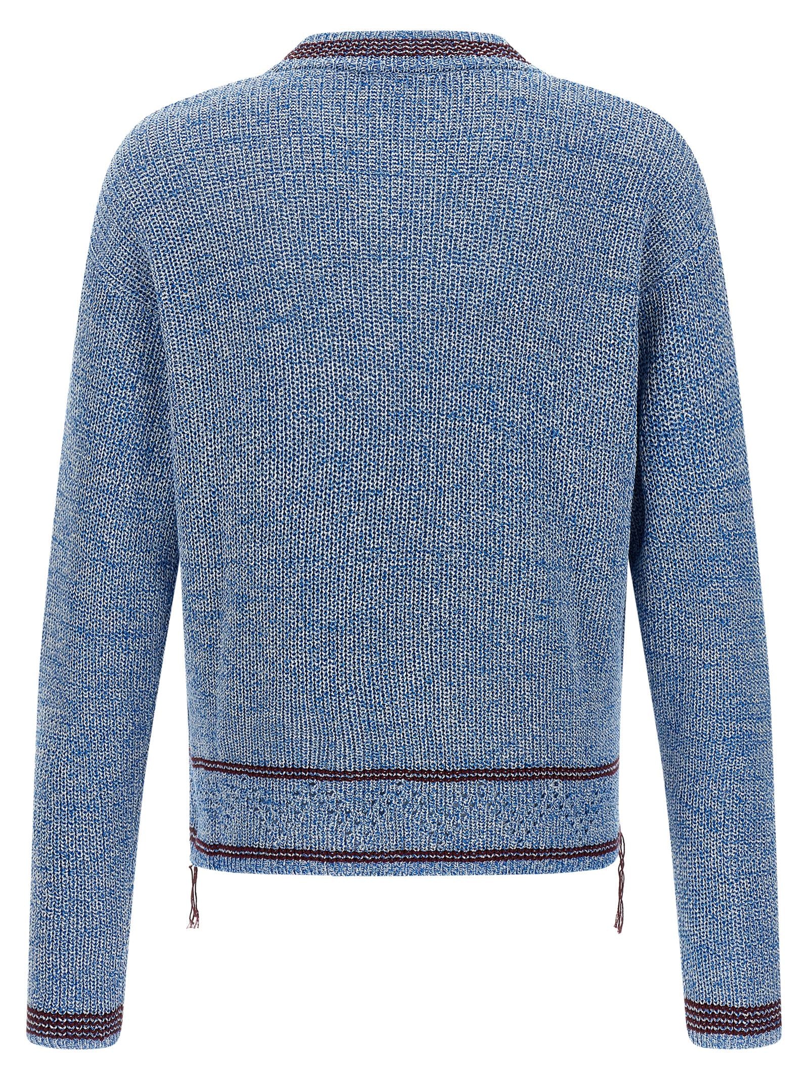Elevate your wardrobe with the Marni Blue Cotton Cardigan, a testament to artisanal luxury crafted from 100% cotton, embodying sophistication and timeless elegance.