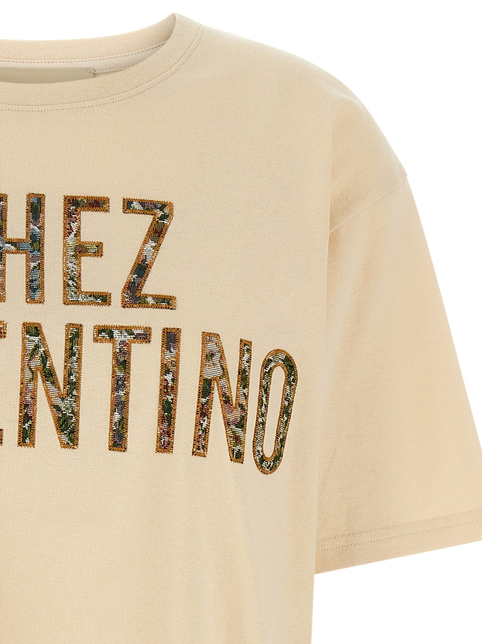 Discover the Valentino Garavani Beige Cotton T-Shirt, a masterpiece of artisanal elegance crafted from premium cotton, embodying luxury and sophistication for discerning tastes.