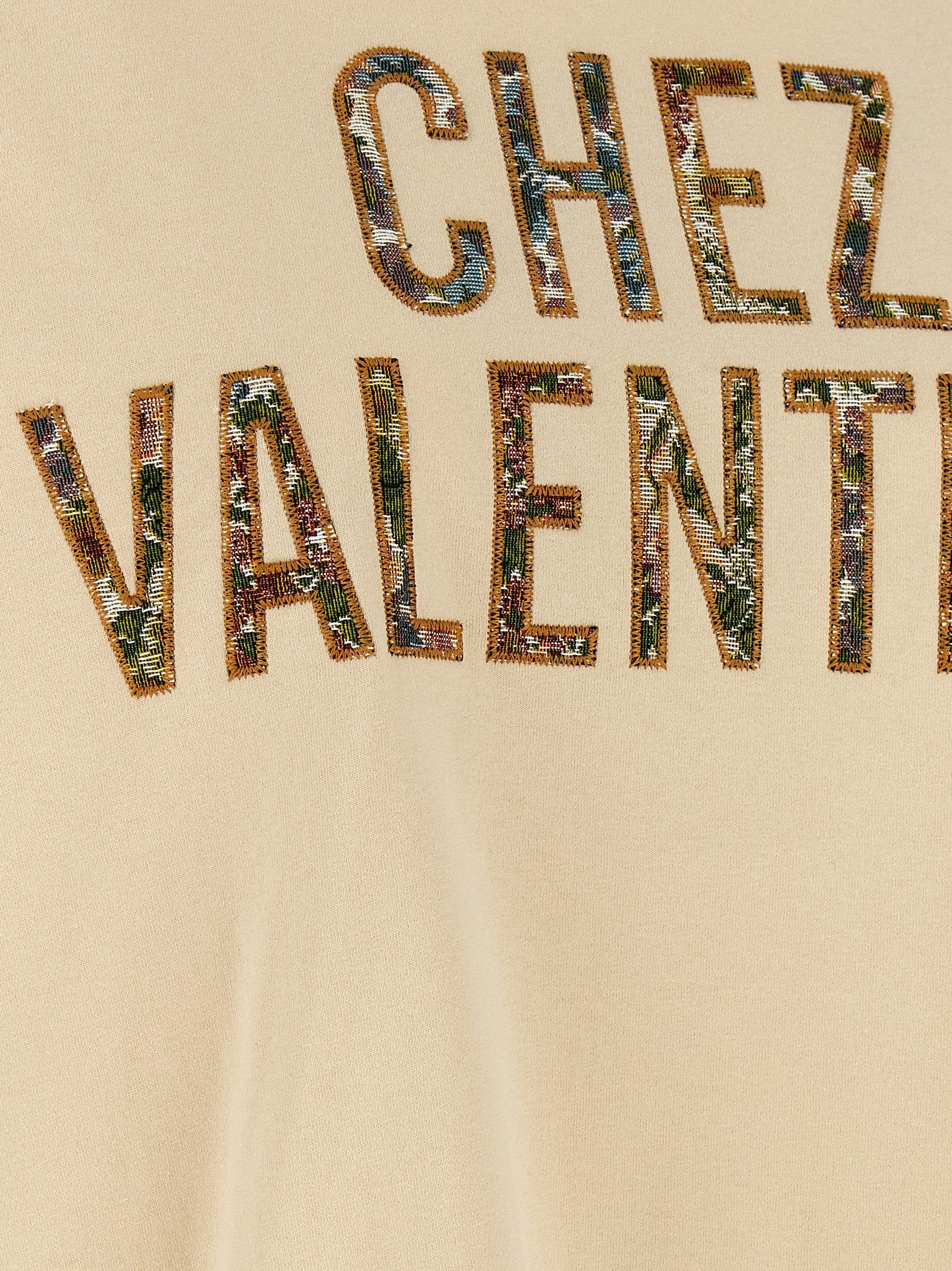 Discover the Valentino Garavani Beige Cotton T-Shirt, a masterpiece of artisanal elegance, crafted from premium cotton with exquisite embroidery, perfect for the discerning connoisseur.