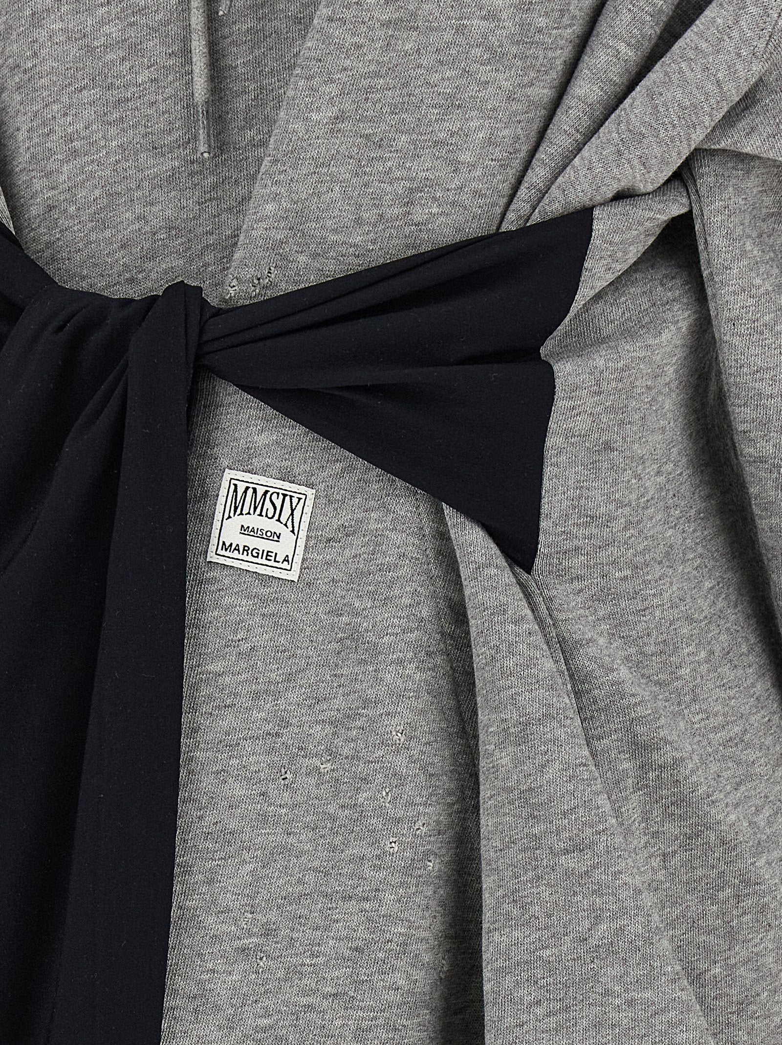 Elevate your wardrobe with the MM6 Maison Margiela Gray Cotton Short Dress, a luxurious hoodie mini dress crafted from 100% cotton, embodying edgy sophistication and timeless style.