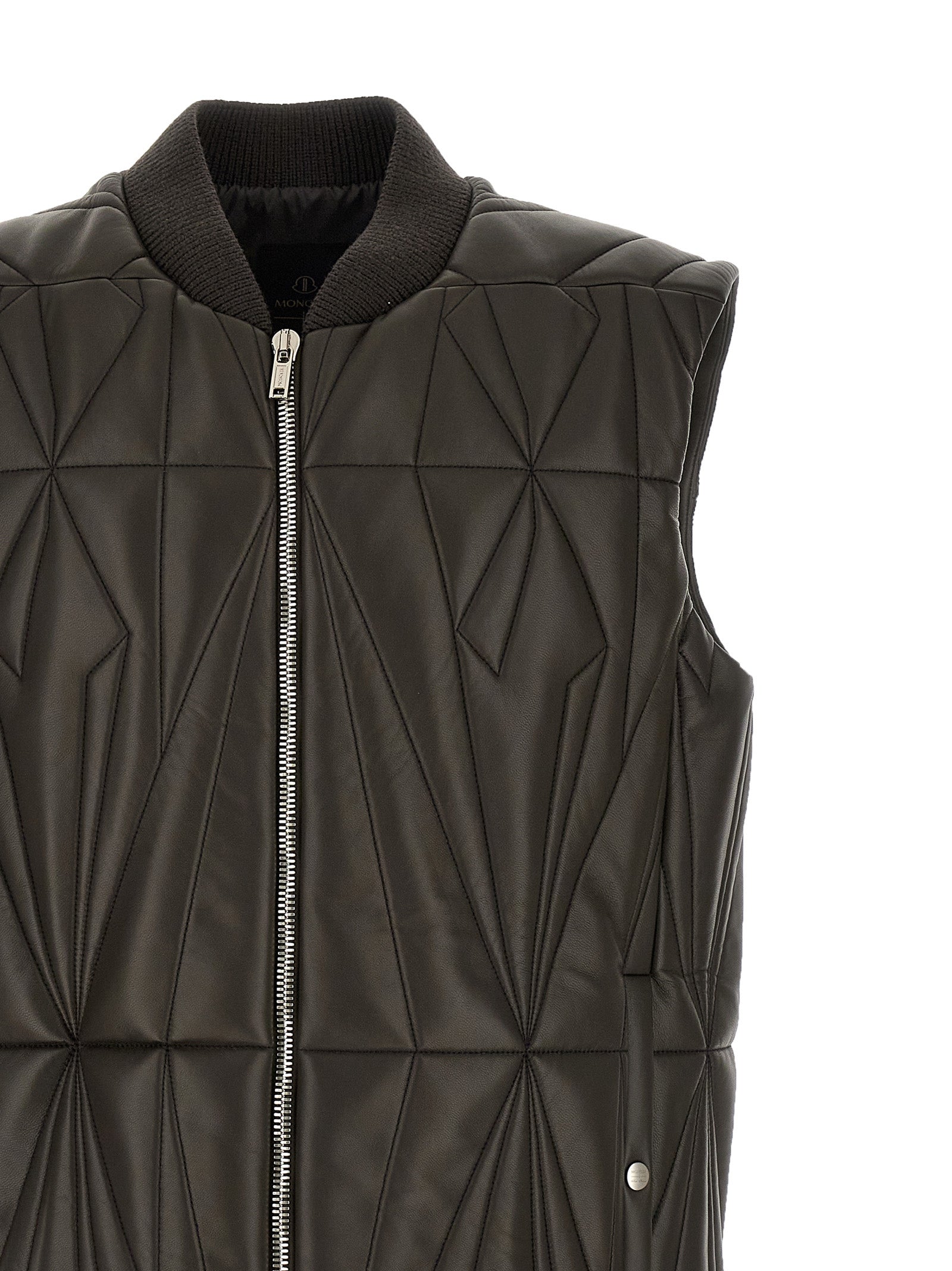 Elevate your wardrobe with the RICK OWENS x Moncler Geocamo Flight sleeveless jacket, crafted from luxurious lamb leather, embodying sophistication and modern elegance.